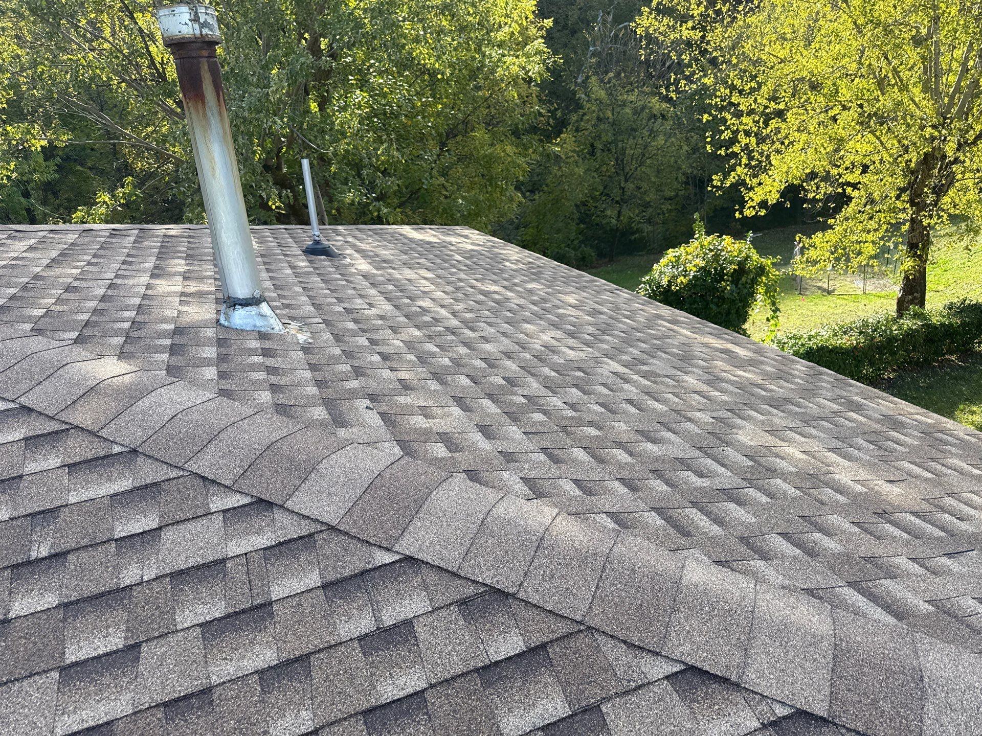 Residential Roofing Installation using GAF Timberline HDZ Shakewood by Rainstoppers Roofing