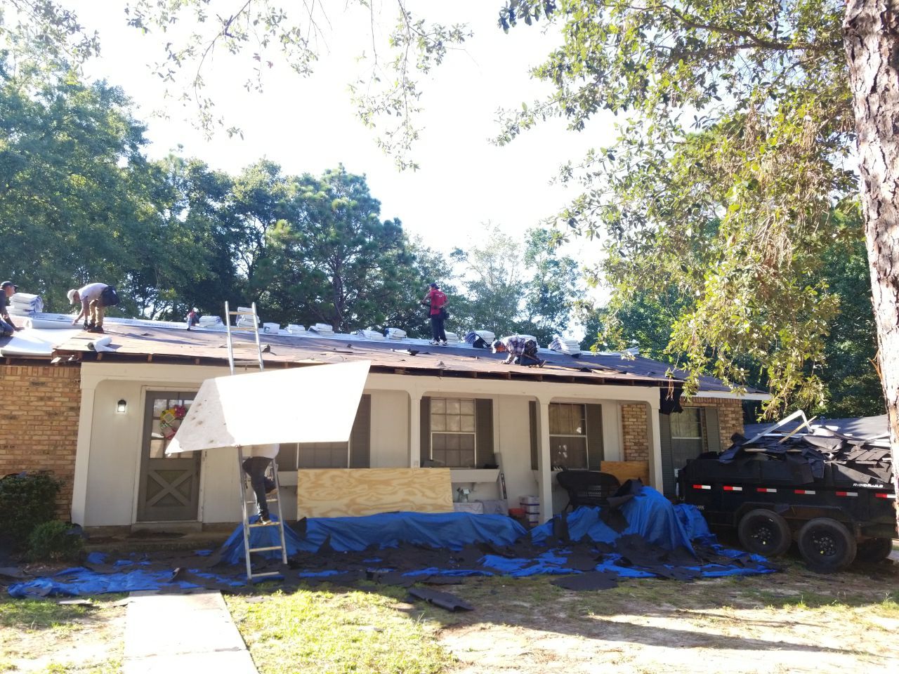 Residential Roofing Installation using Roof Replacement by American Roofing & Construction LLC