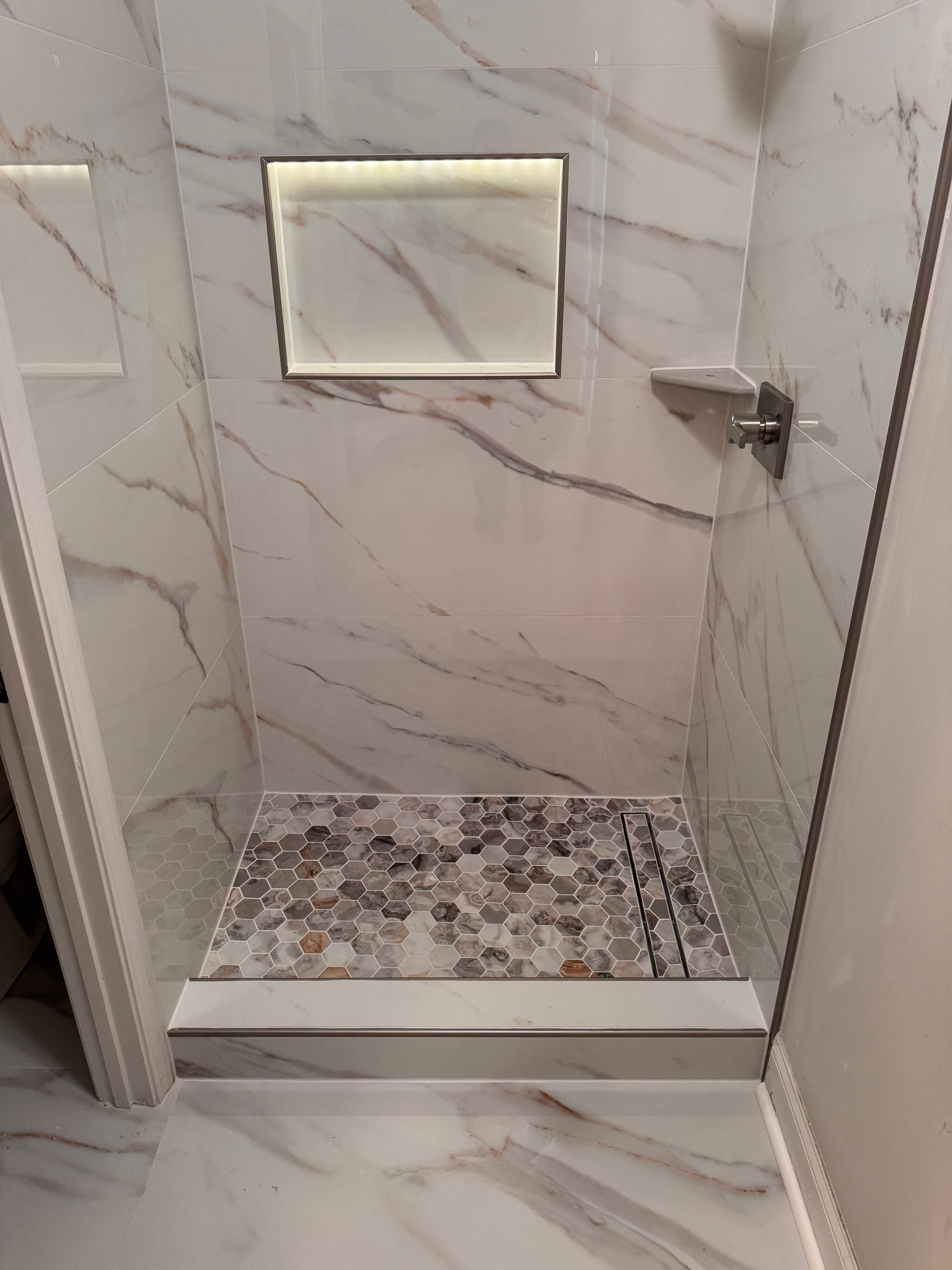 Three showers renovation by Prudencio