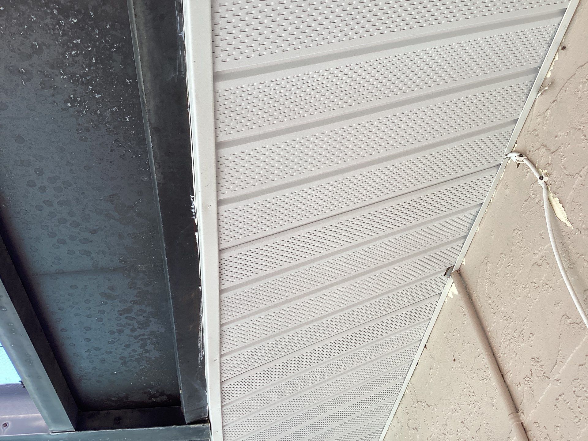 White Seamless Gutters and Splash Guards in Fort Myers FL by Gutter Professor by Gutter Professors