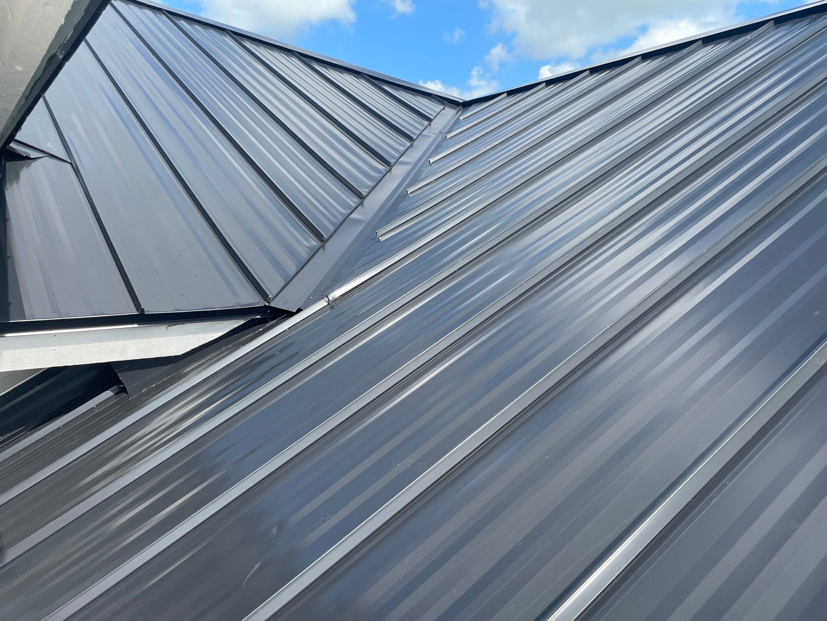 24ga 1" Nail-Strip Matte Black by Total Roofing System The Metal Roof Experts