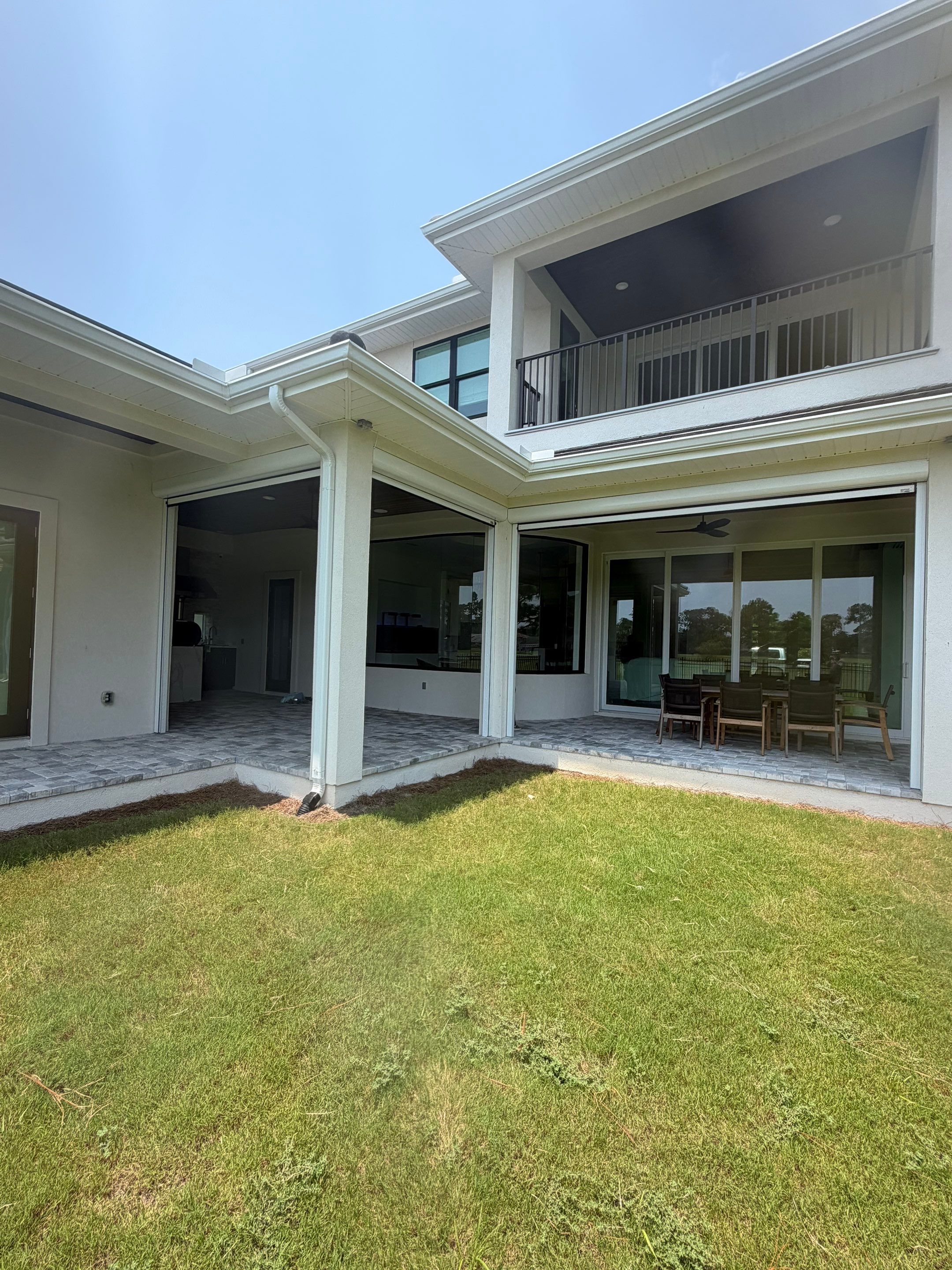 Motorized Screen and Solar Shade Installation in Panama City Beach by Brannan Aluminum Inc.