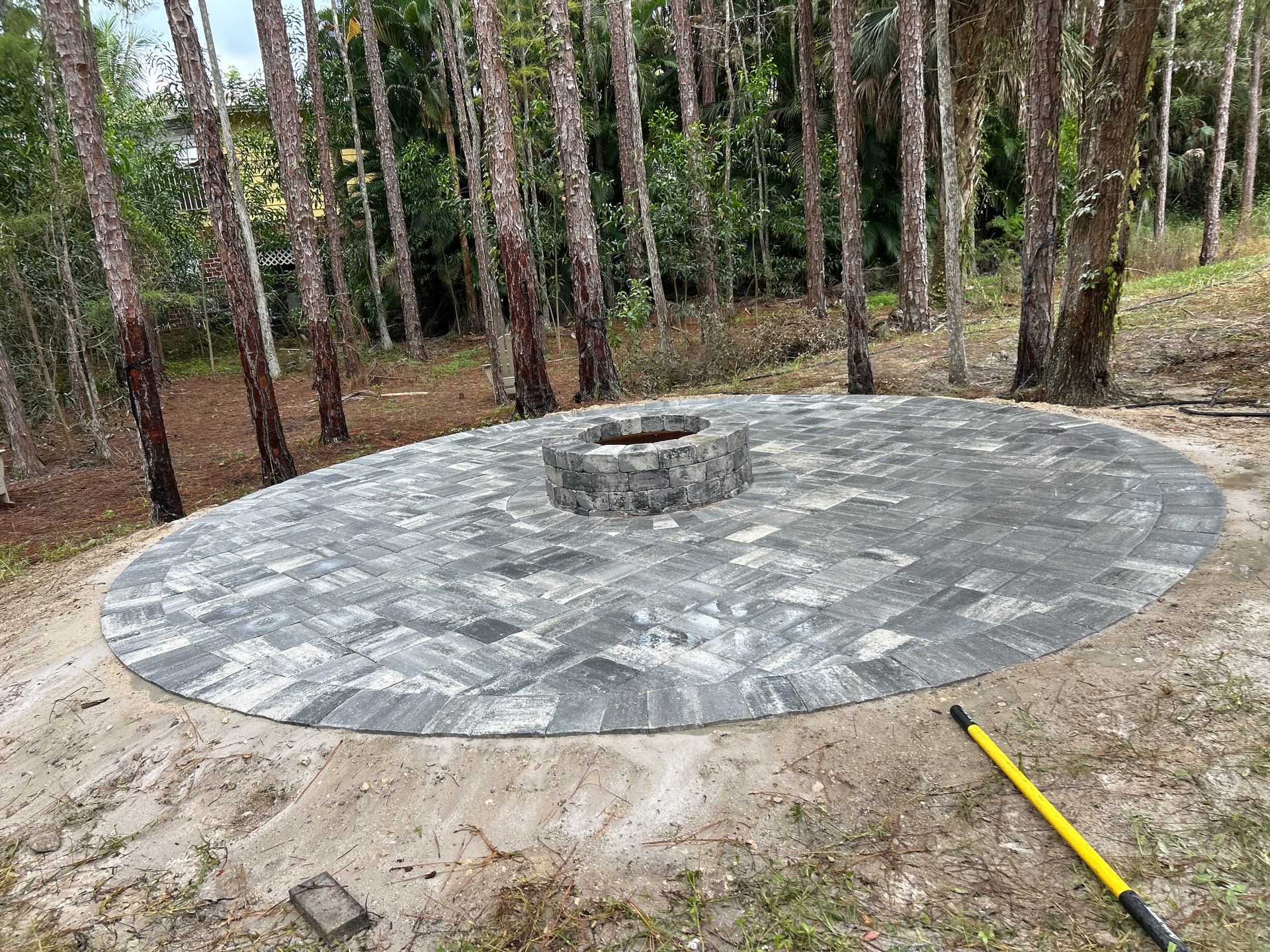 Fire pit and seating area/Oaks Blvd Naples by Old Town Pavers Llc