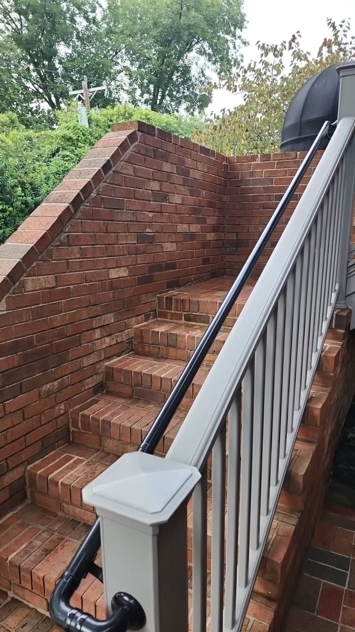 building clean using cleaner by Power Wash Masters LLC