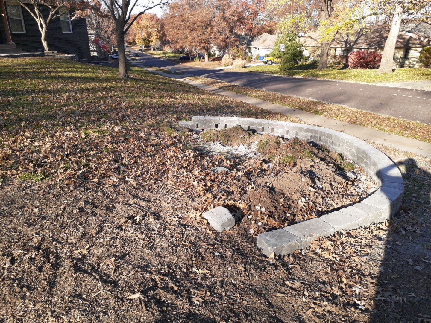Entire Home Landscape and Retaining Walls by LAND ESCAPES LLC