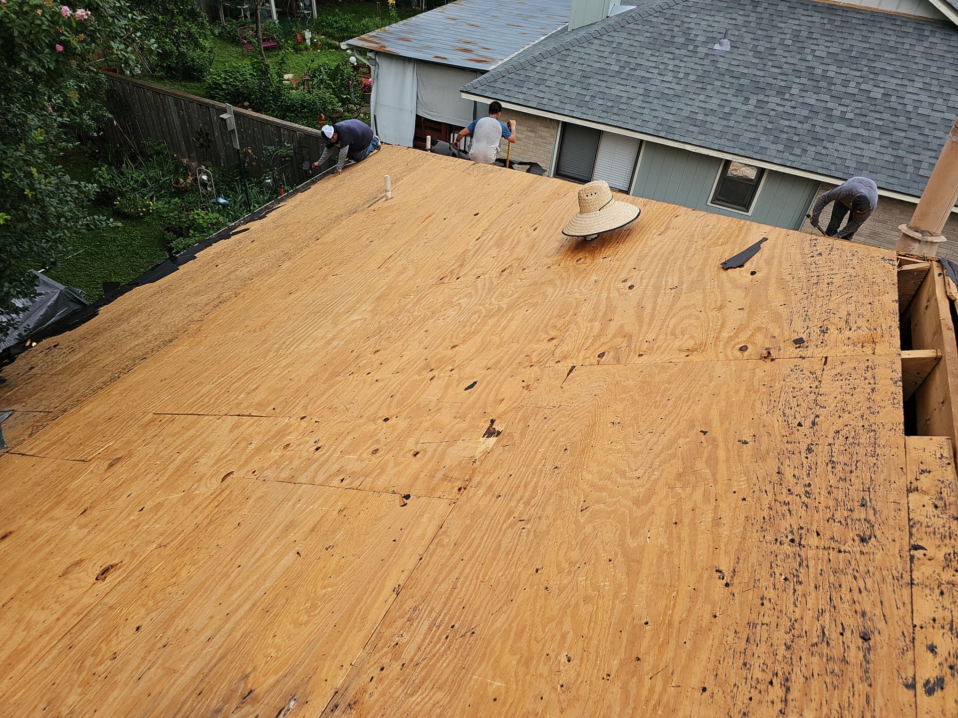 Residential Roofing Installation using Owens Corning TruDef Desert Rose by DeZign Roofing & Exteriors