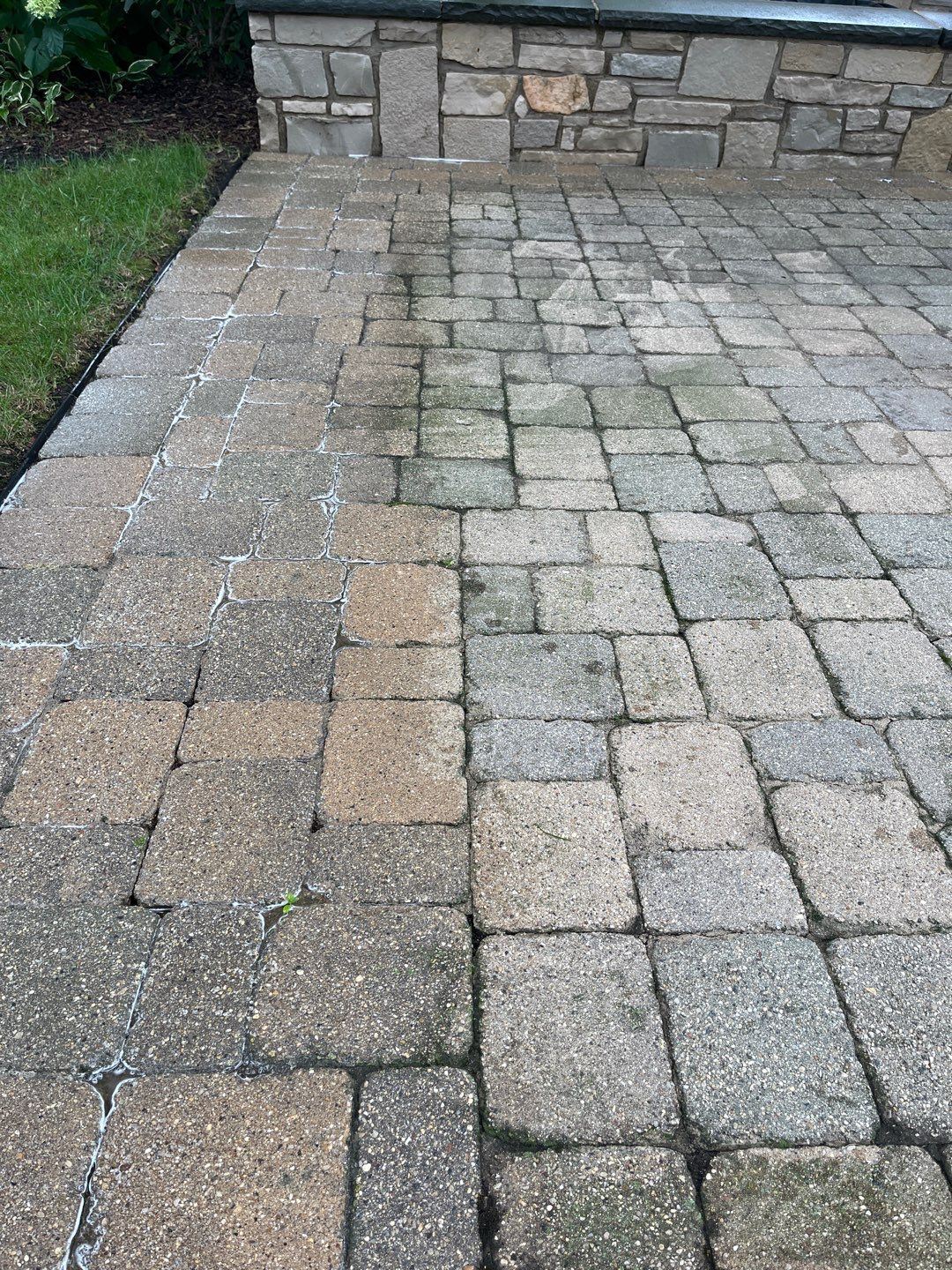 Brick paver cleaning and sanding. by Northern Power Washing LLC.