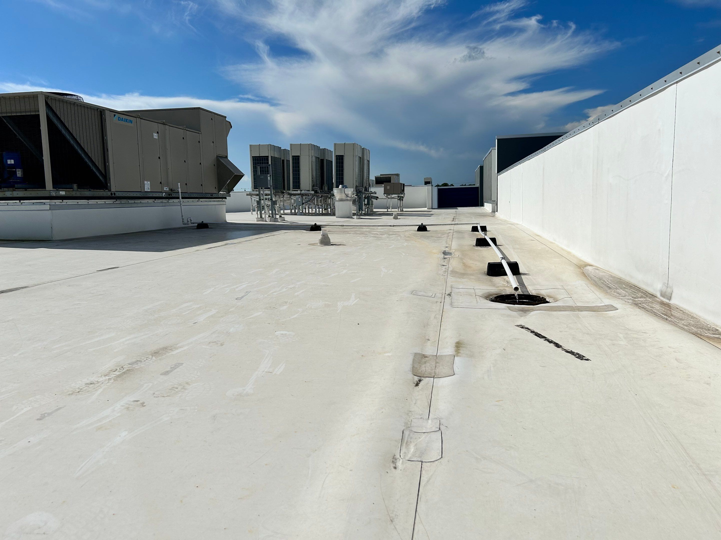 TPO Flat Roof Installation at Dade Quail Roost in Miami by AJF ROOFING INC