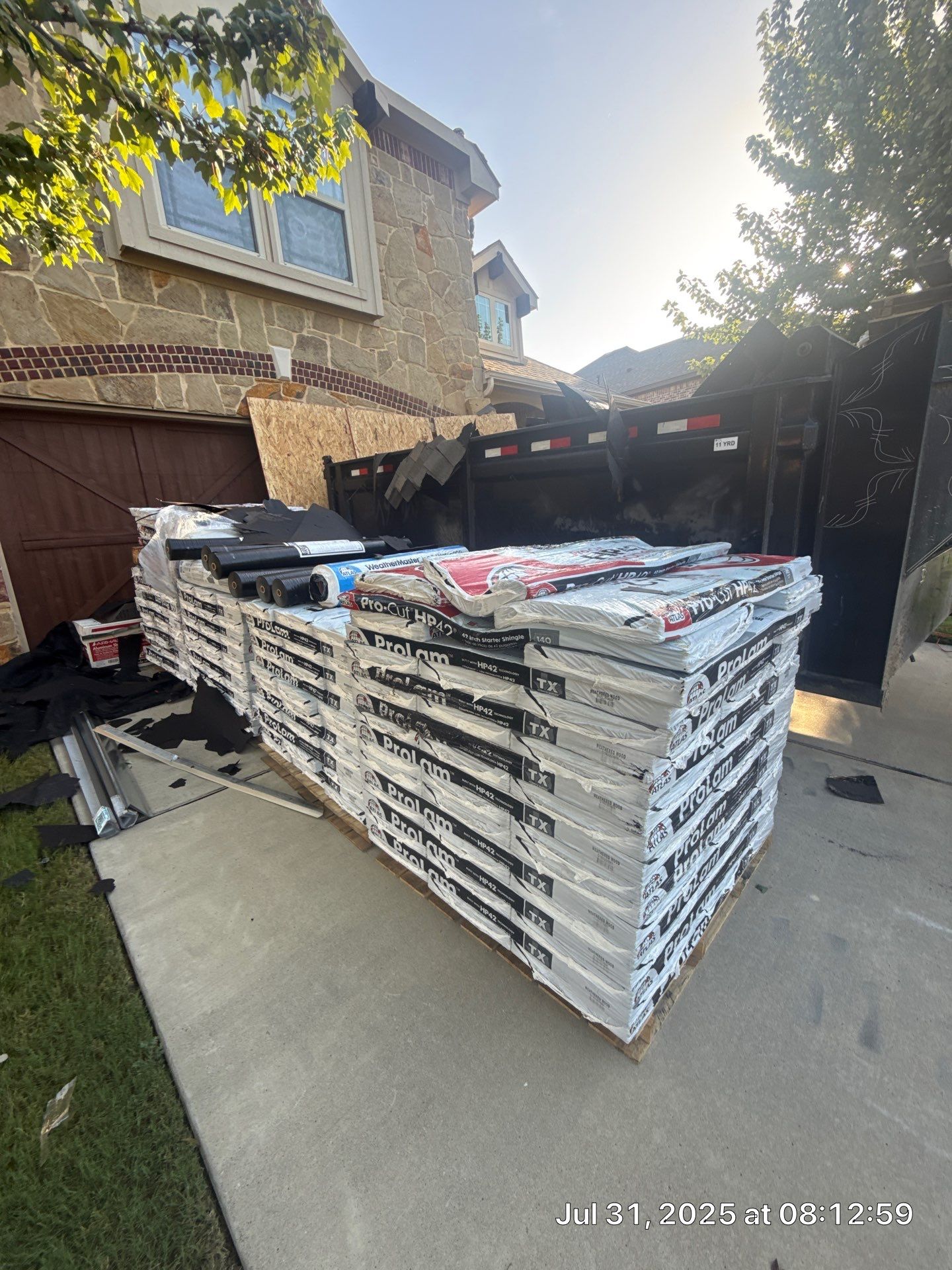 Residential Roof Replacement using ATLAS PROLAM WEATHER WOOD by Elite Roofing LLC