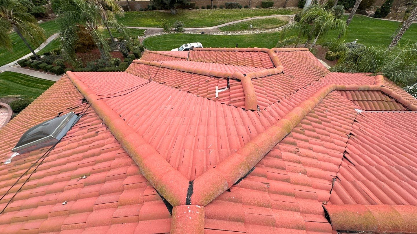 Tile refurbish project using existing tiles and replaced underlayment and battens by Straight Edge Roofing Inc