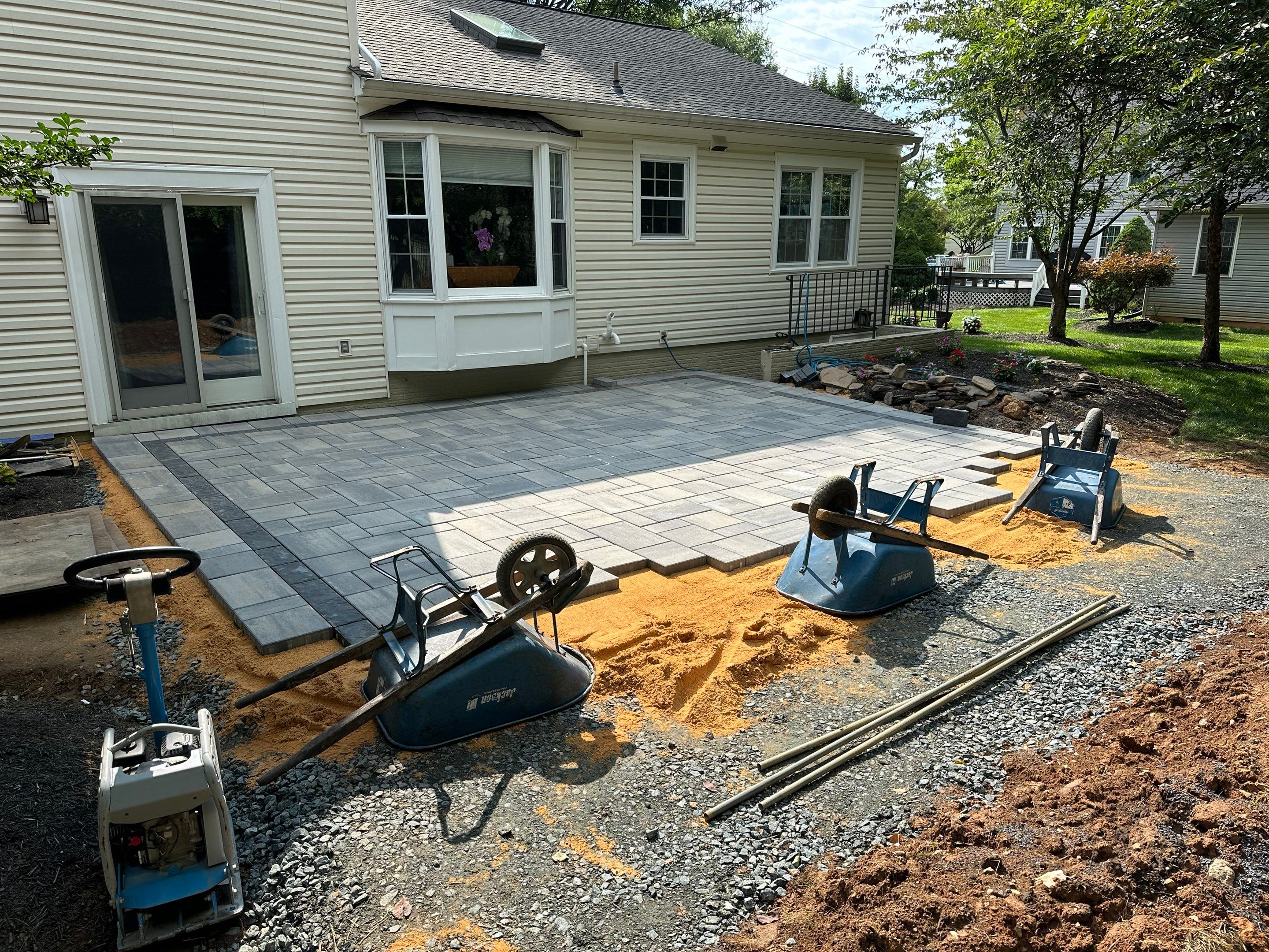 Backyard Transformation using Techo-Bloc Pavers by The Smet Companies, LLC
