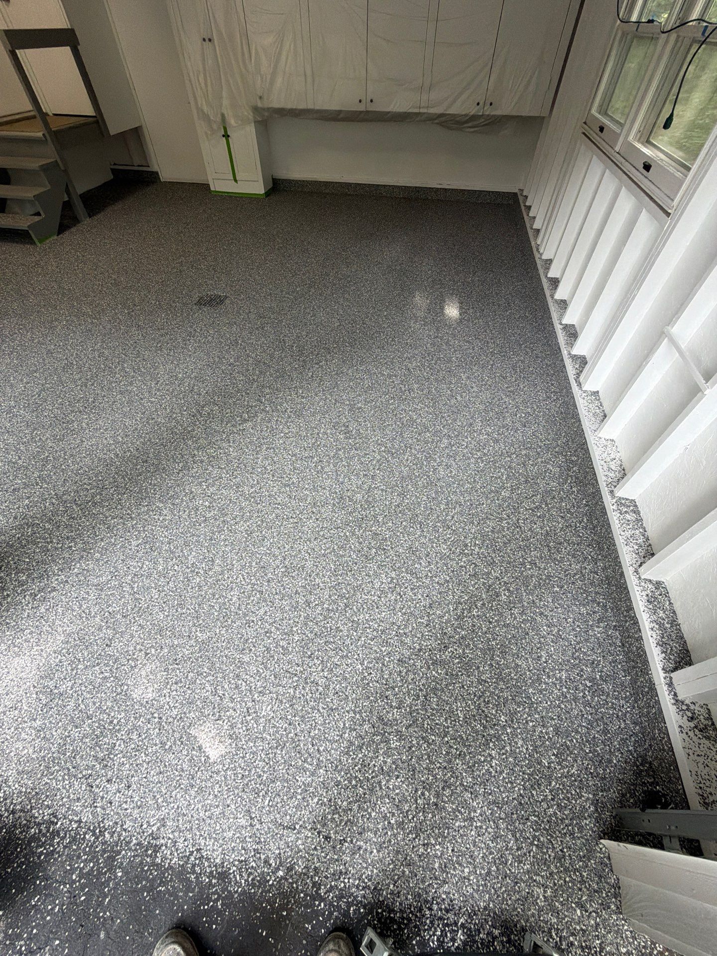 Pentwater Garage Epoxy Flake Floor Installation and Exterior Refinement by Gordon Painting