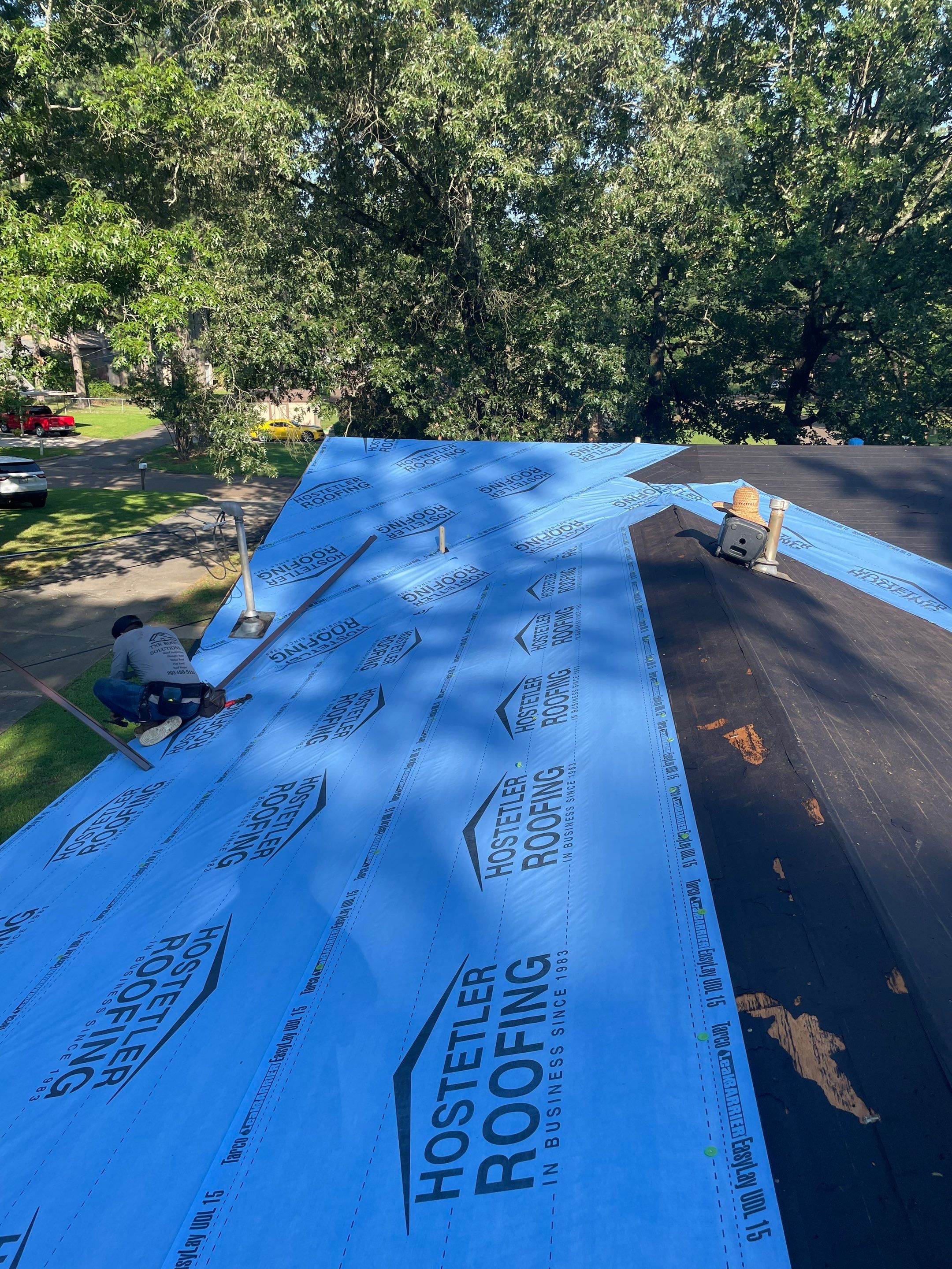 Storm Restoration Reroof: 25 Year 3-Tab Shingle by Hostetler Roofing