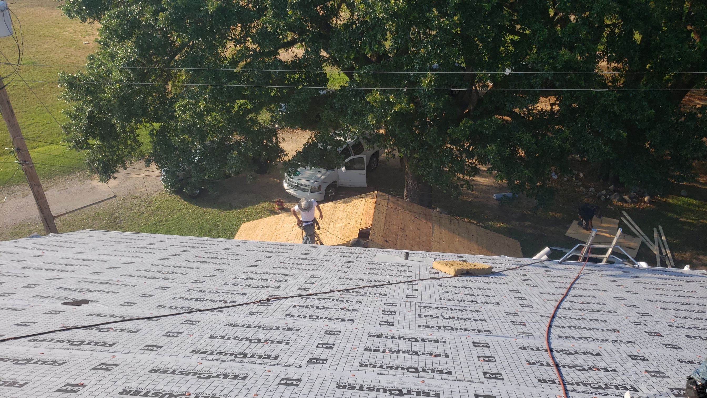 Residential Roofing Installation using Roof Replacement by American Roofing & Construction LLC