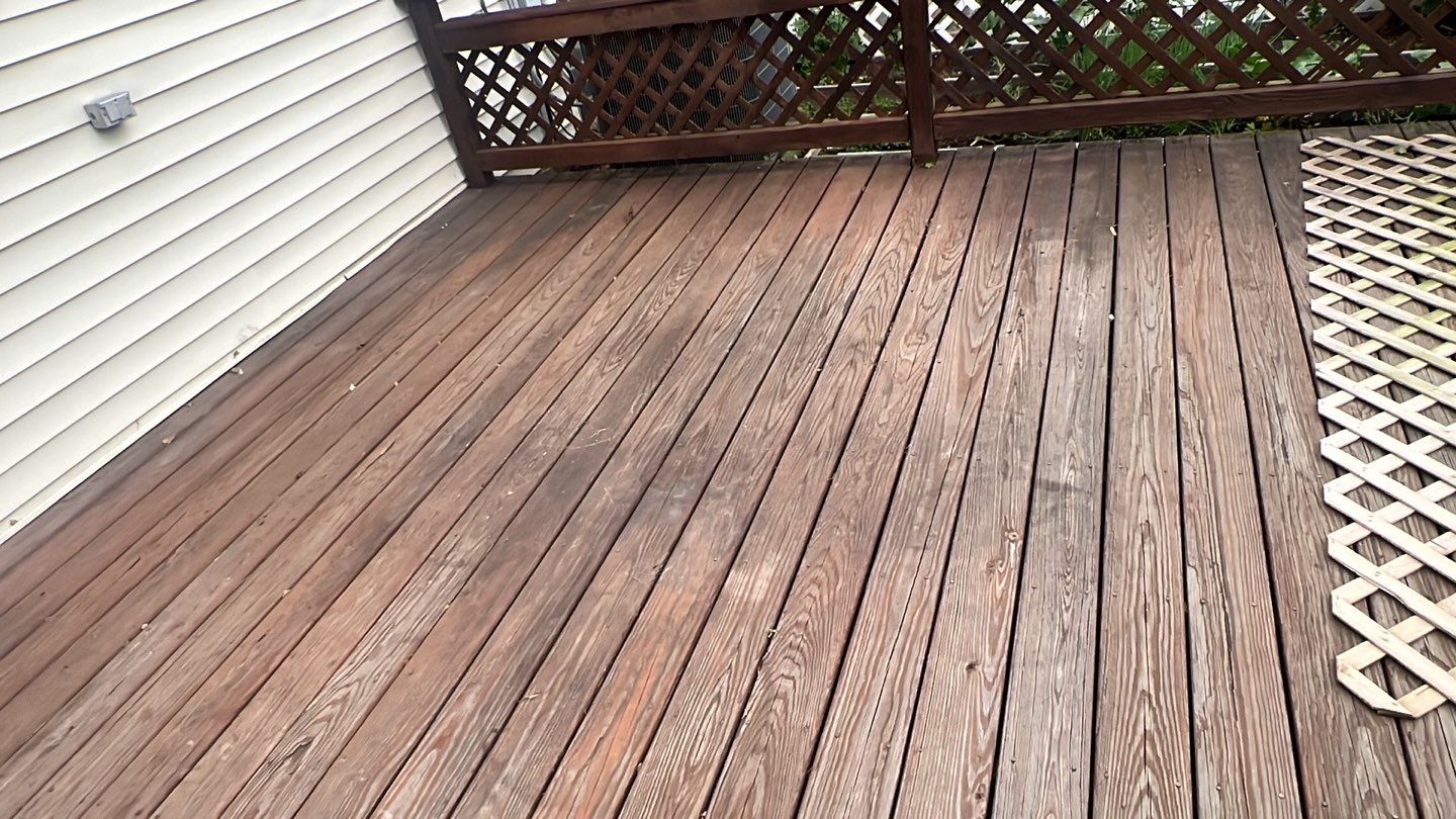 Wood cleaning and staining using Armstrong cloark oil stain by Northern Power Washing LLC.