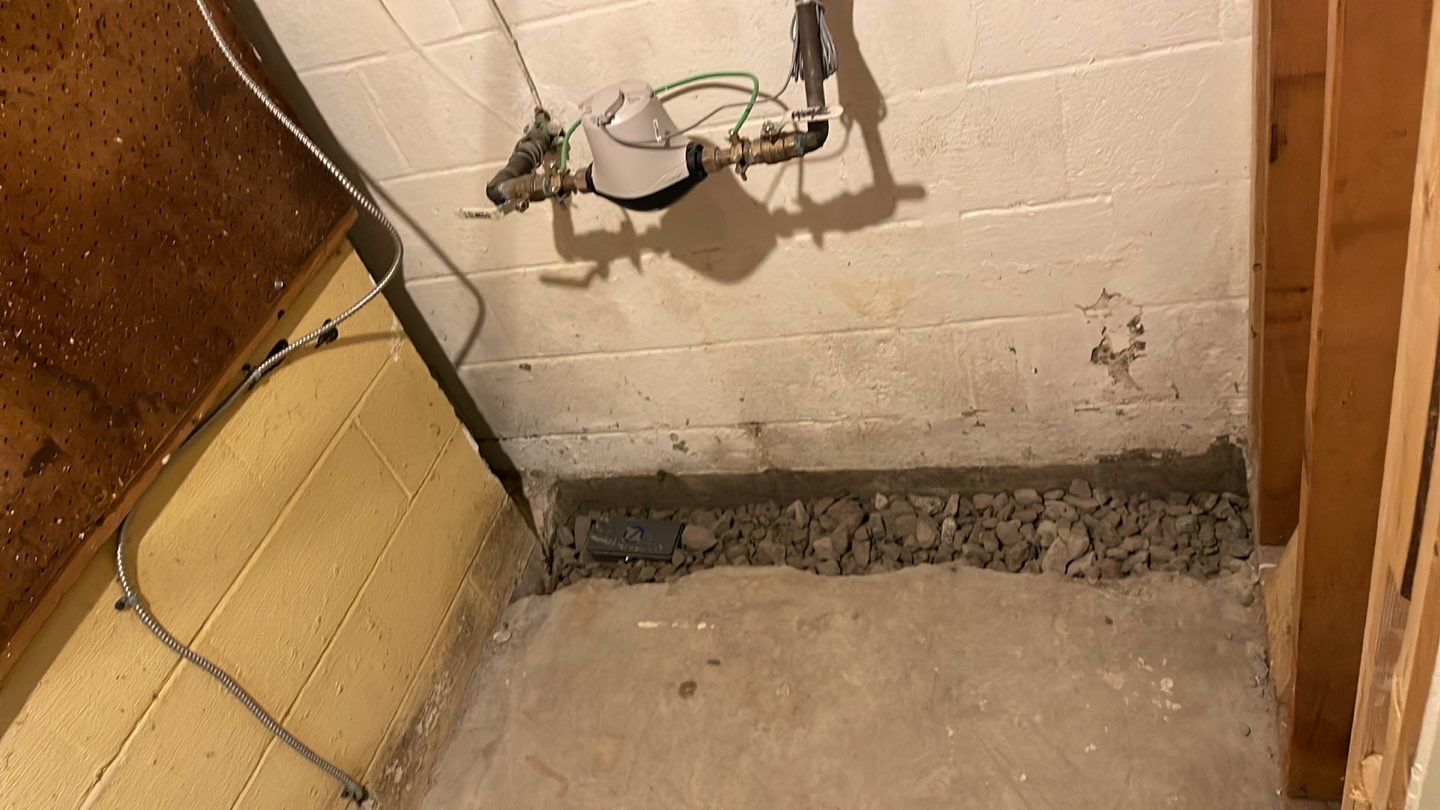Embedded Fiber Reinforcement and Basement Waterproofing using GrateDrain Waterproofing System by Toledo Basement Repair