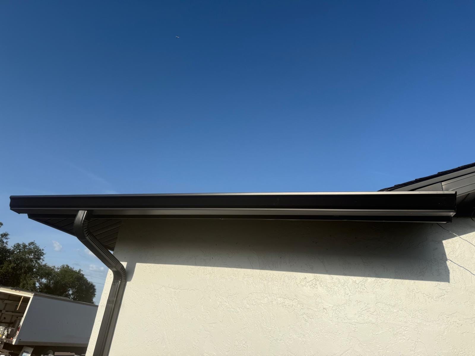 New Downspouts and Splash Guards in Sarasota FL by Gutter Professors