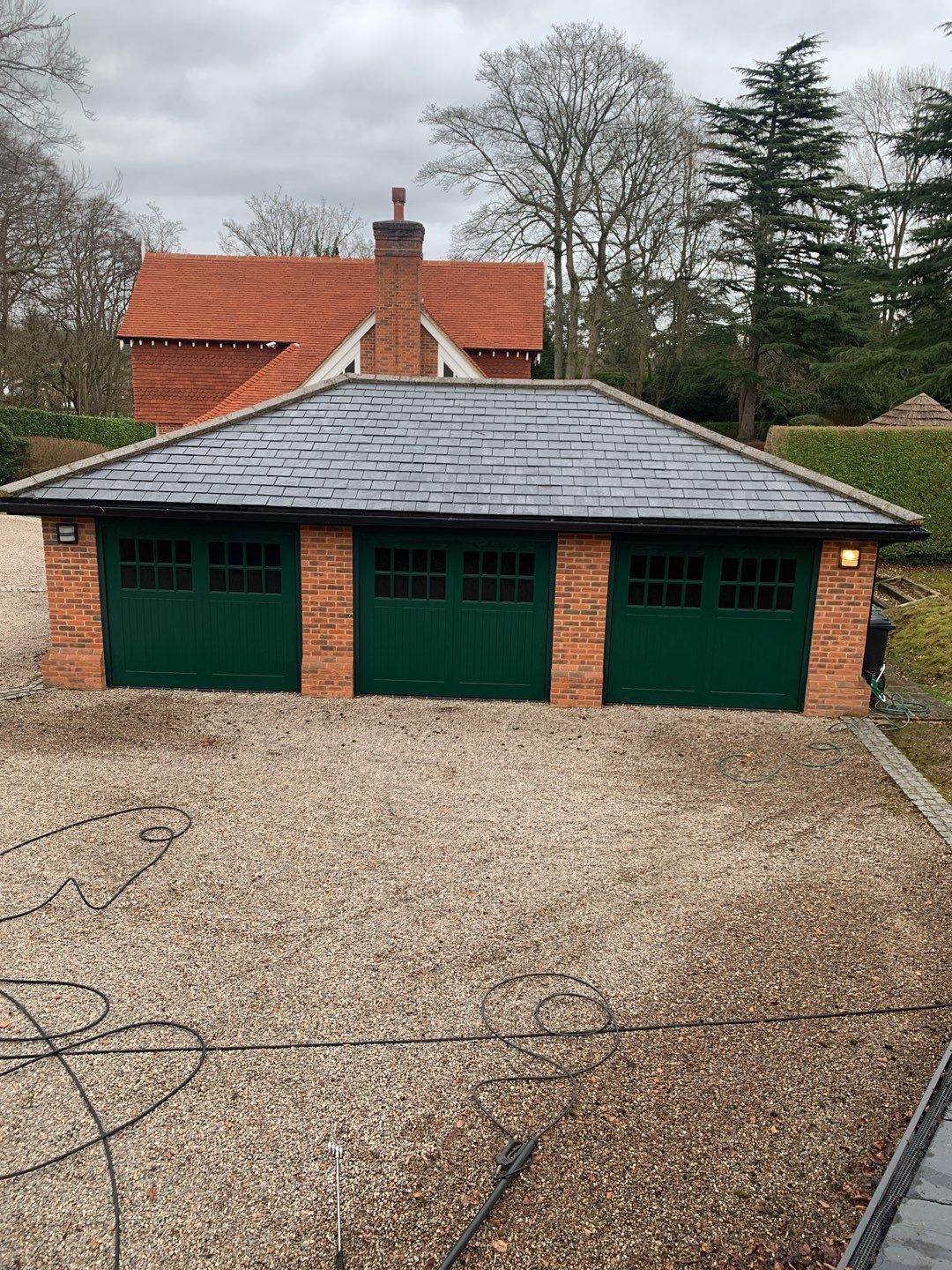 Garages Roof Cleaning using Honda 15lpm Low Pressure Washing Machine by Ges Exterior Cleaning ltd