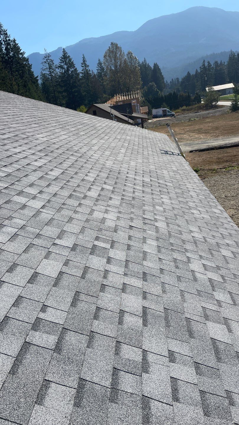 Residential Roofing Installation using OC Oakridge shingles by Top Notch Roofing Inc