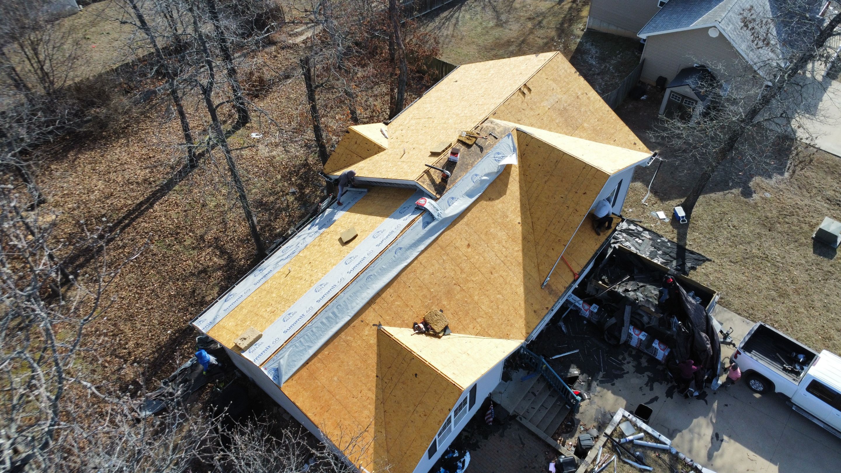 Residential Roof + Gutters & Downspouts Install  by Titan Commercial & Residential Roofing 