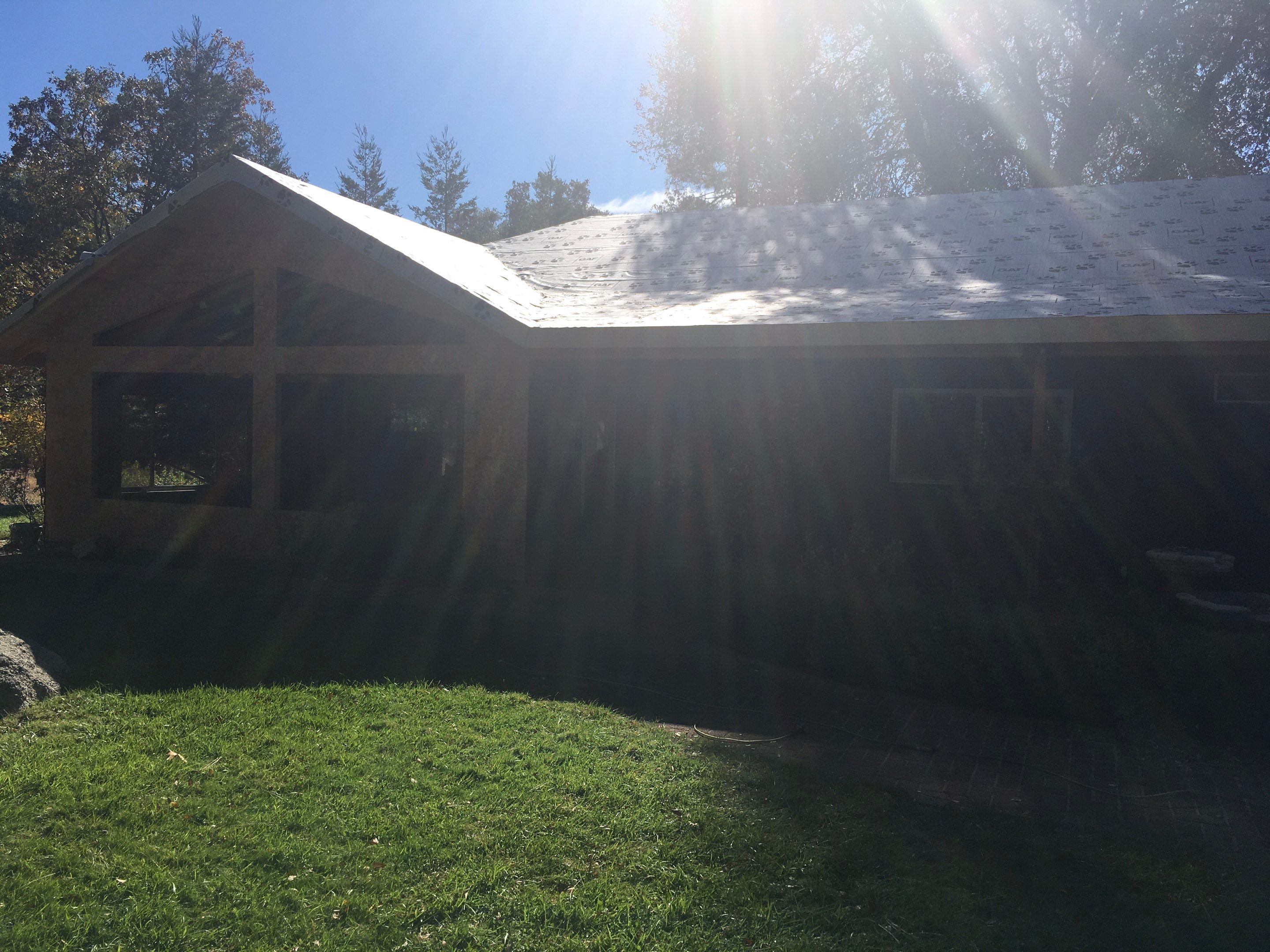 Metal roofing installation using Standing seam metal roofing system by Straight Edge Roofing Inc