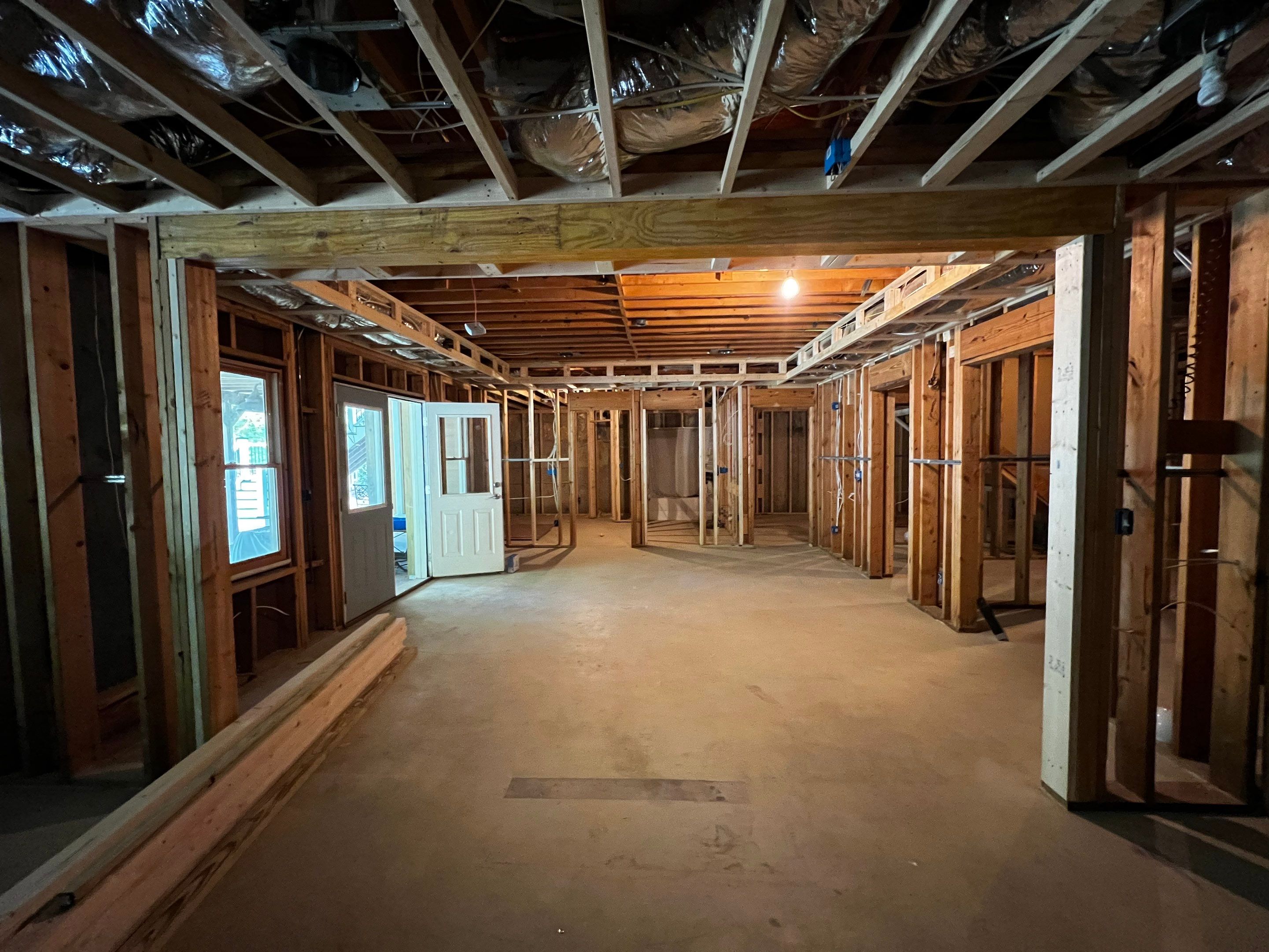 Custom Basement Remodeling With Home Theater and Bar in Woodstock by Swift Home Renovations