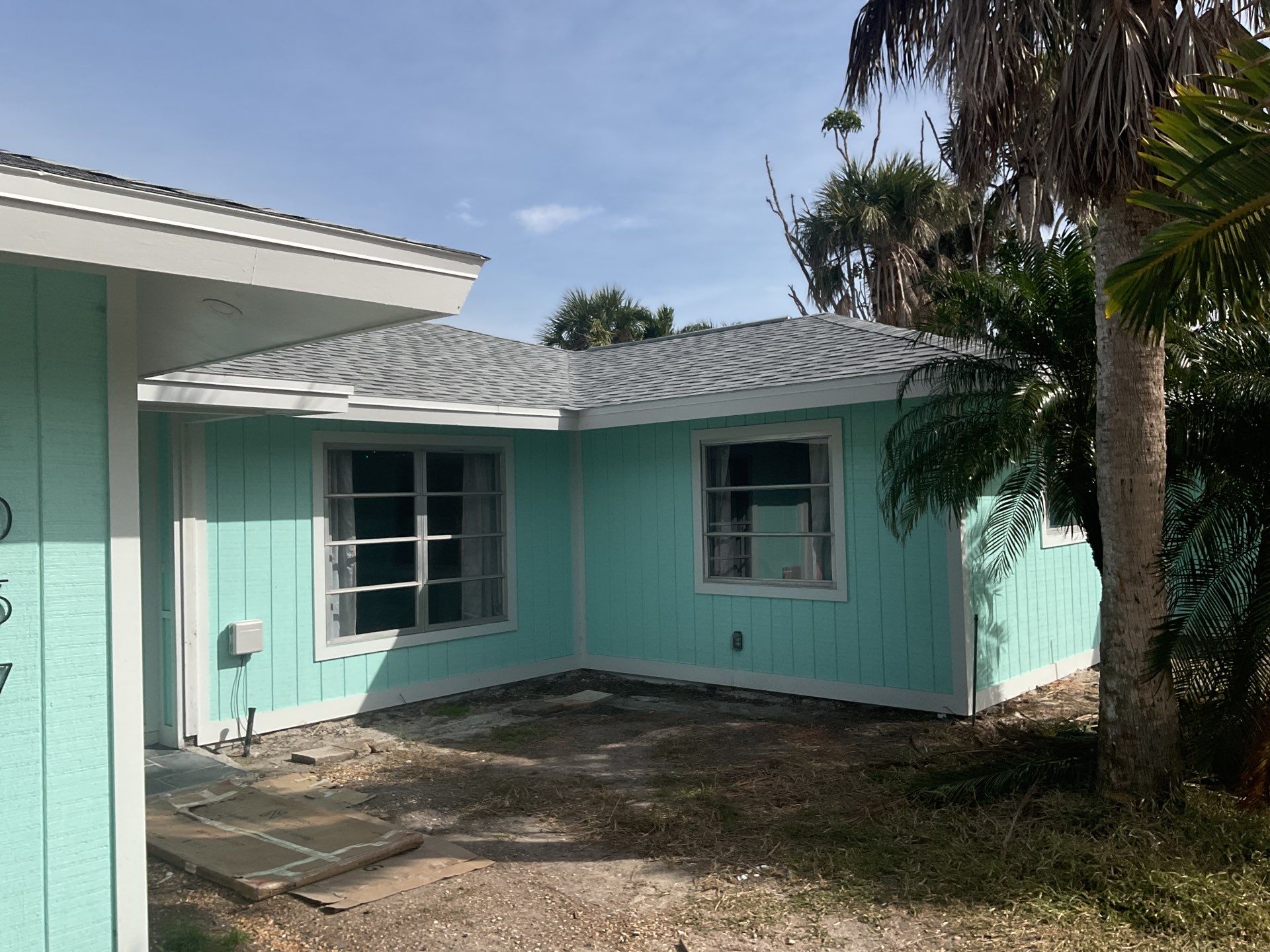 White Seamless Gutters Installation in Sanibel FL by Gutter Professors