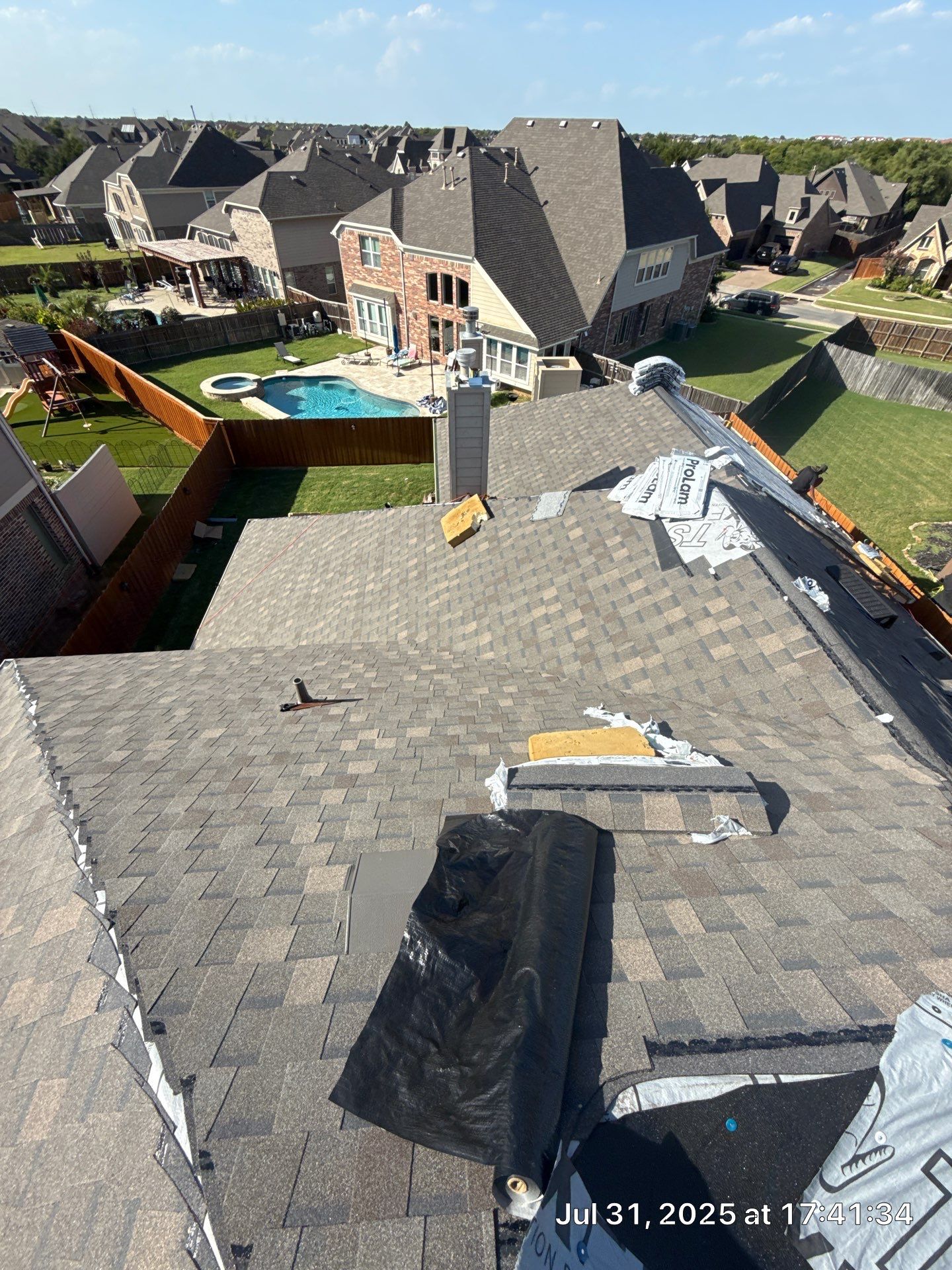 Residential Roof Replacement using ATLAS PROLAM WEATHER WOOD by Elite Roofing LLC