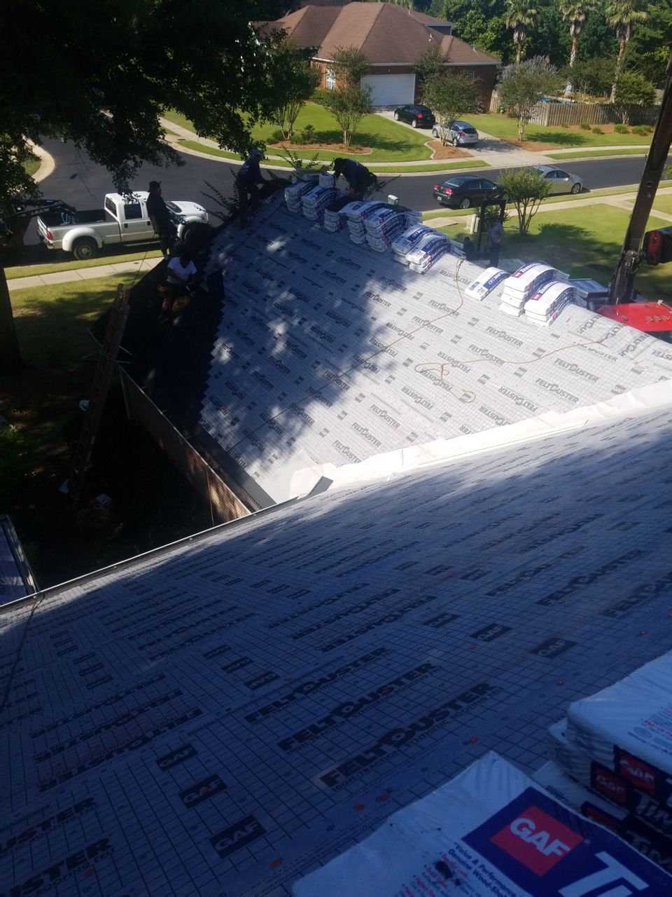 Residential Roofing Installation using Roof Replacement by American Roofing & Construction LLC