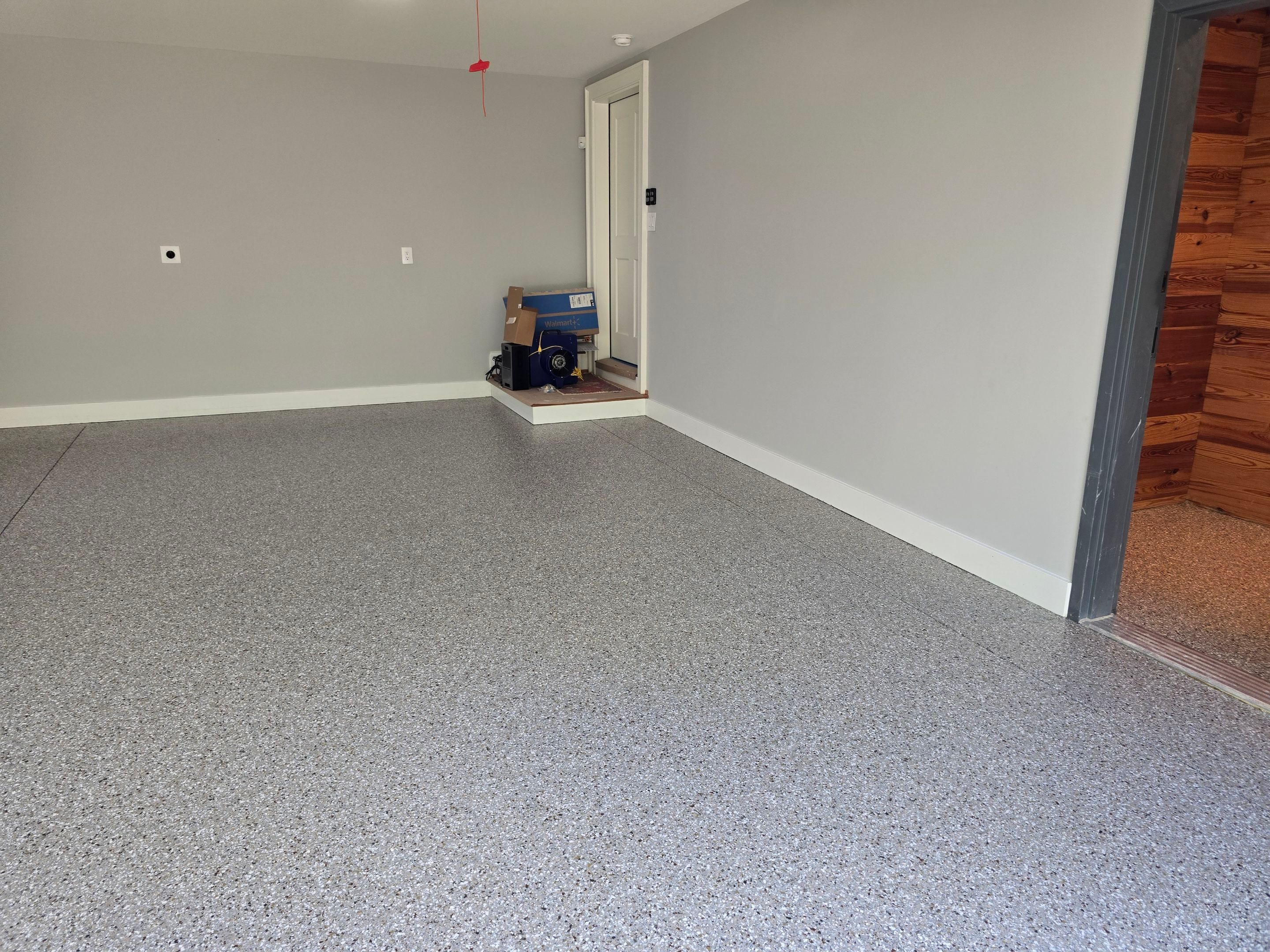 Two Garages Using Creekbed  by Elite Floor Solutions