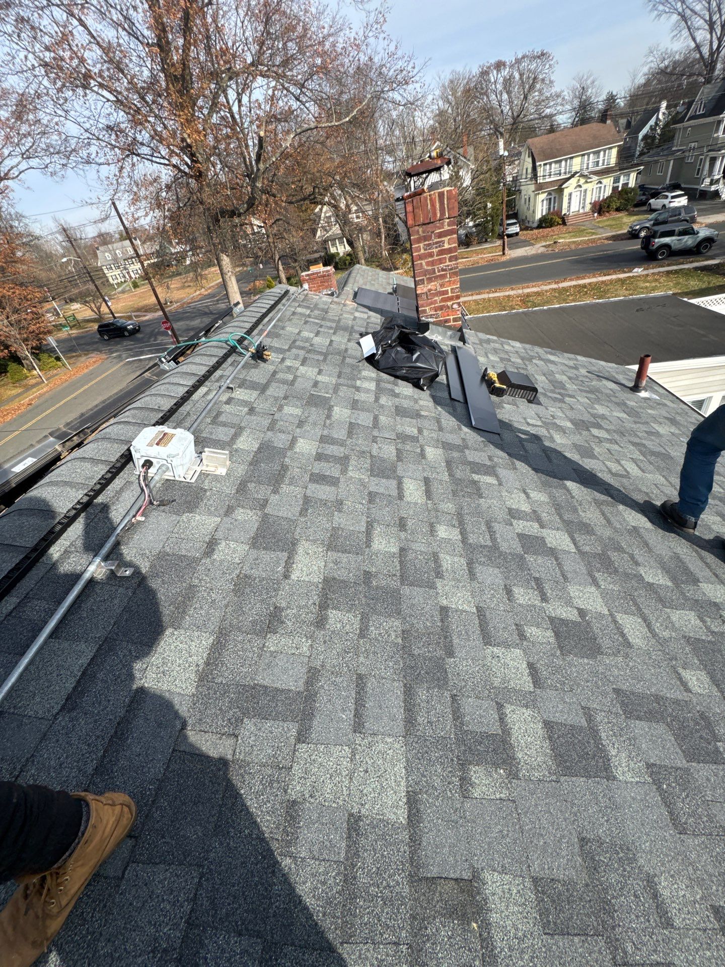 Estate Gray Shingles by Reimagine Roofing