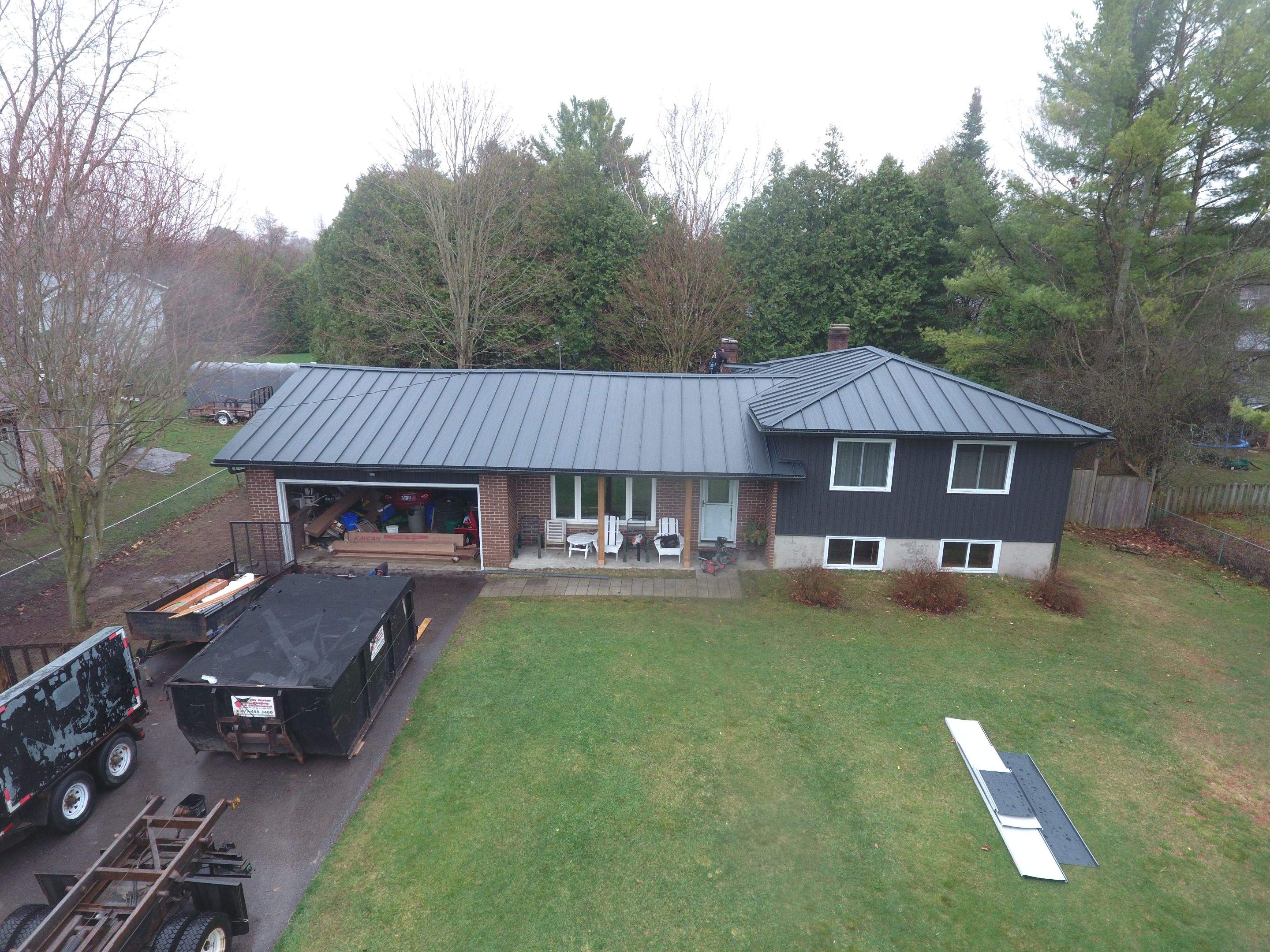 Residential Roofing Installation using 24 Ga Standing Seam Metal by Jay Carter Roofing & Sheet Metal
