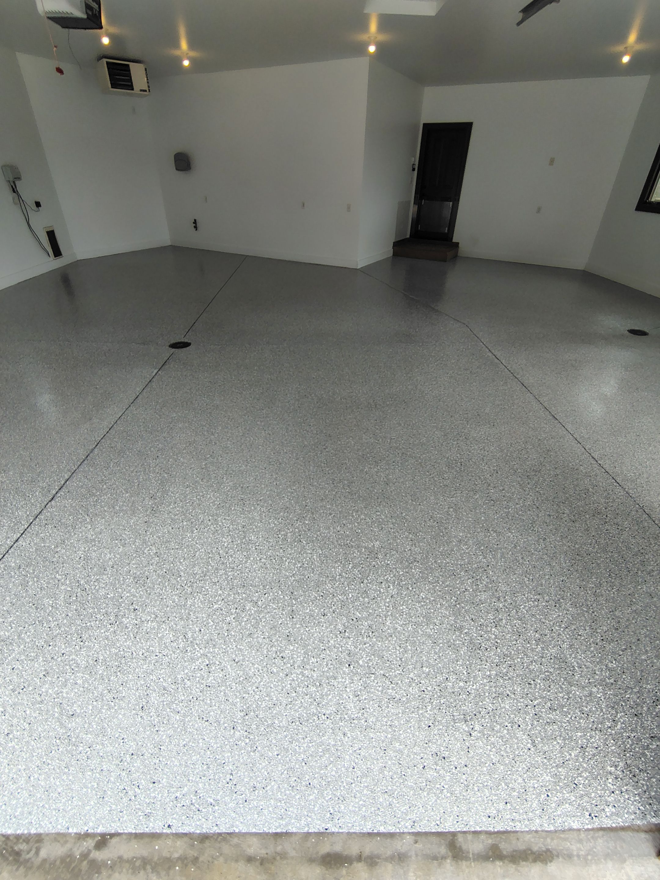 Feather Grey Floor Coating in Sioux Falls, SD by Select Painting, Coatings & Garage Cabinets