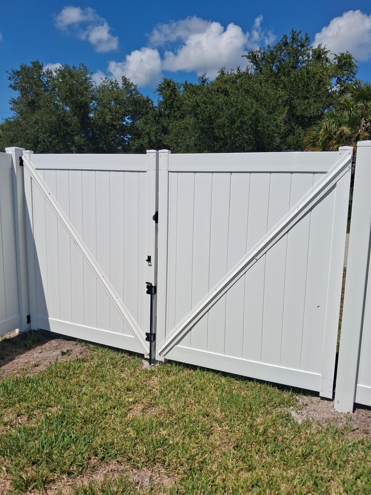 Residential Vinyl Privacy Fence Installation in Port Charlotte by True Fence LLC