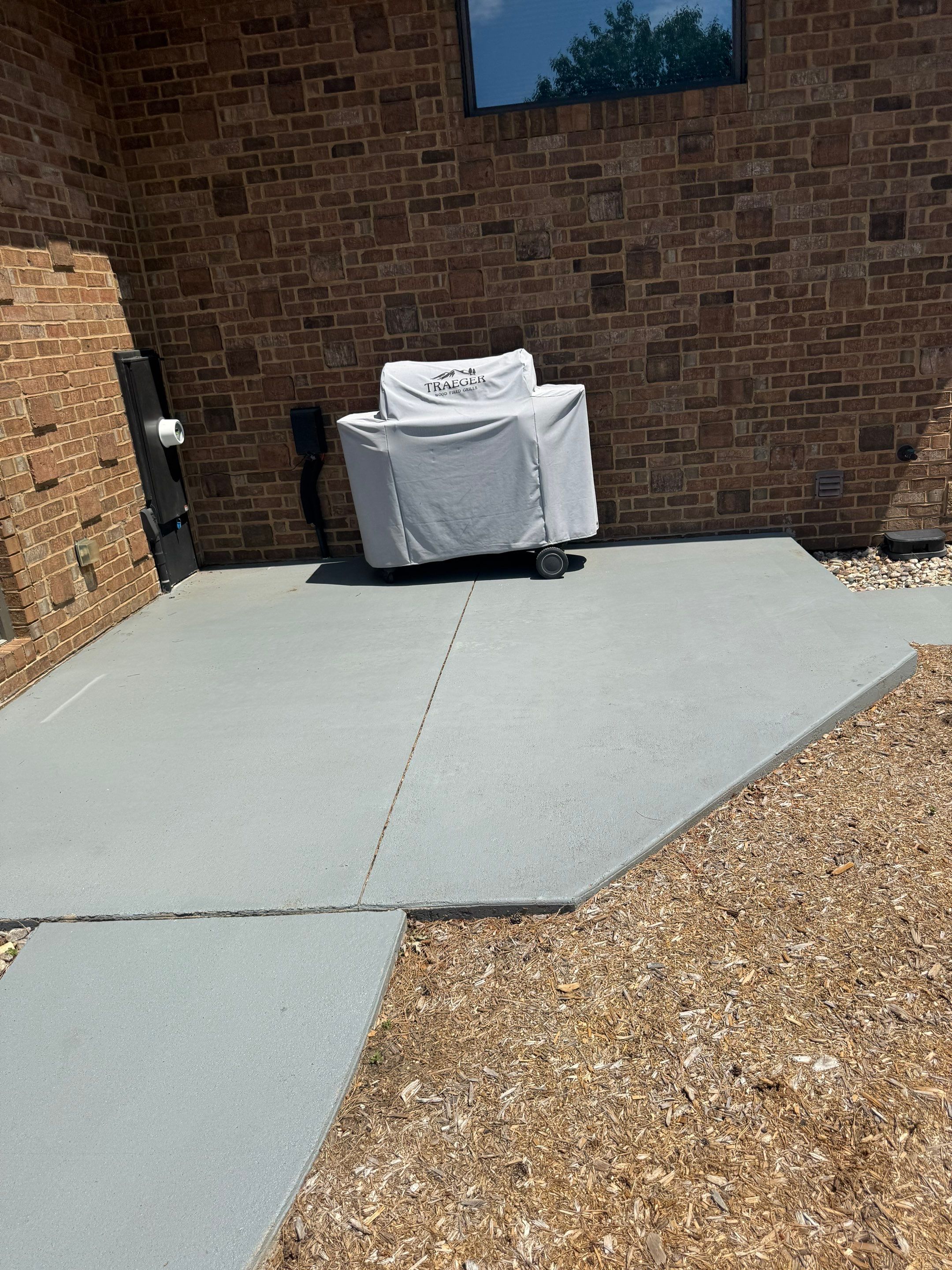 Decorative Concrete Pool Deck and Patio Resurfacing in Sioux Falls by Select Painting, Coatings & Garage Cabinets