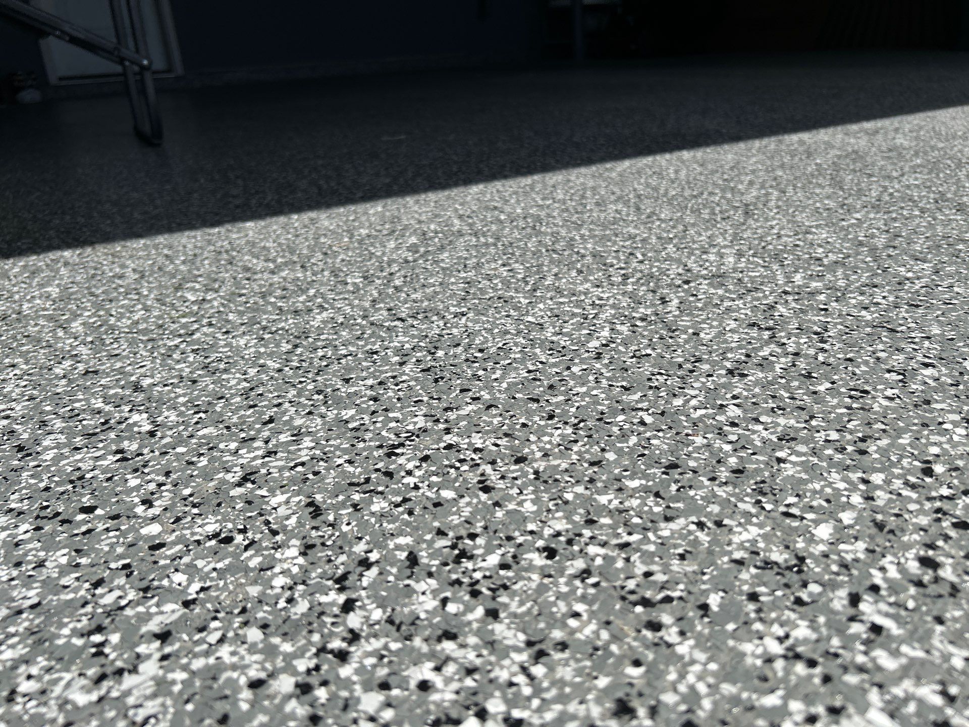 Concrete Patio Coating Installation with Smoke Flake Finish in Airway Heights by Croc Coatings, LLC