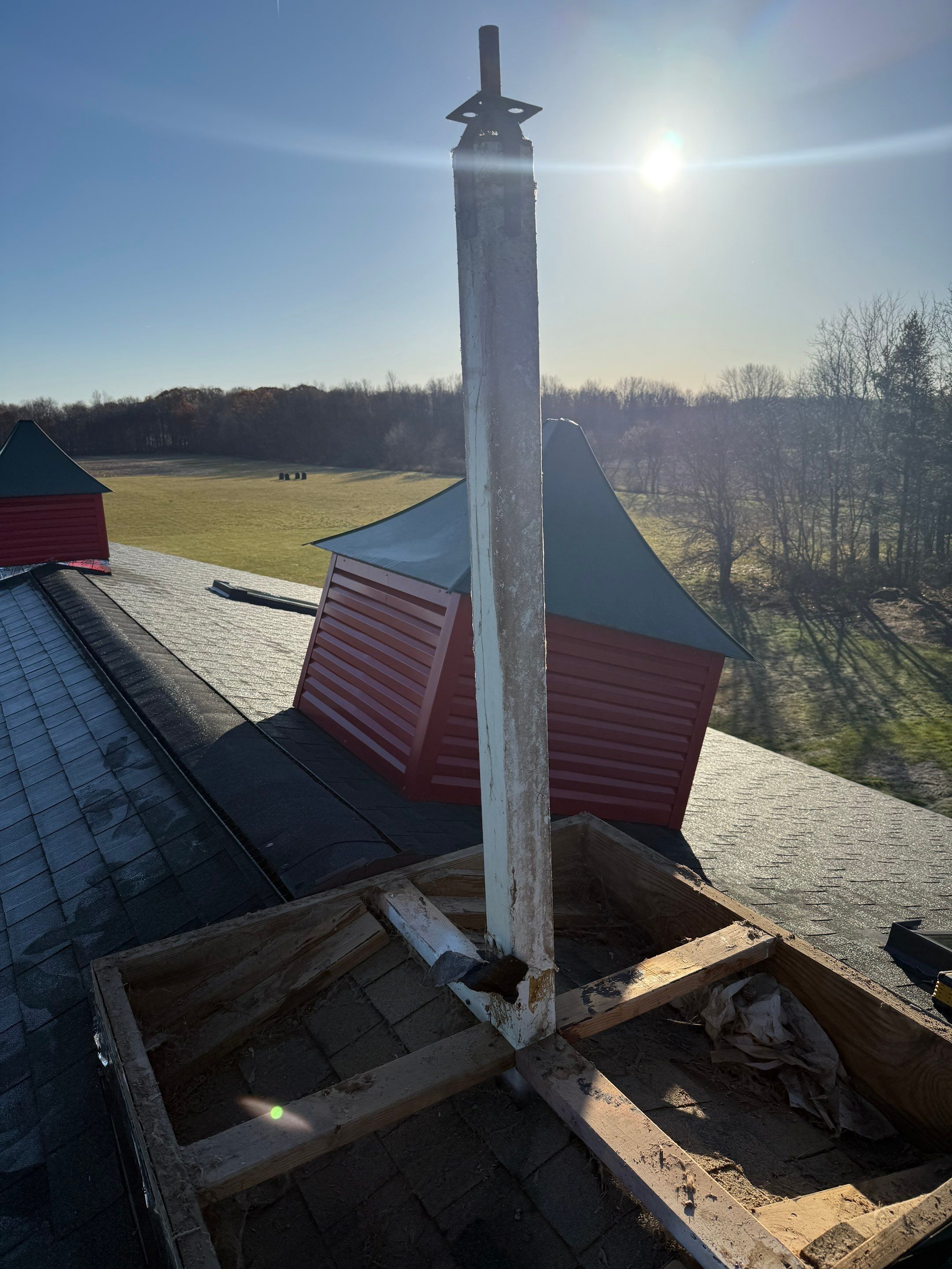 Residential Roofing Replacement with Multiple Skylights in Mason, Michigan by Acme Exteriors