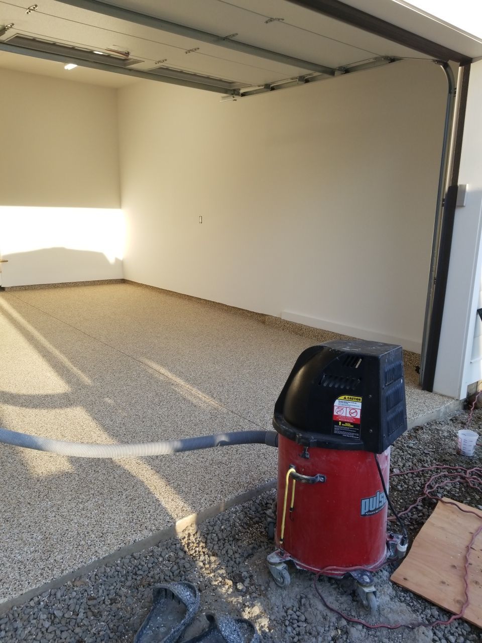 Garage Floor in Sandstone by Spectrum Painting, LLC