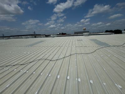 Metal Roof Maintenance- Skylight Installation 