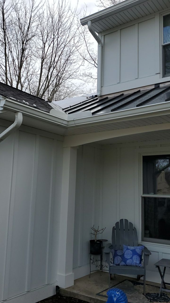 James Hardie Siding  using James Hardie Board and Batten, White by Absolute Roofing and Construction