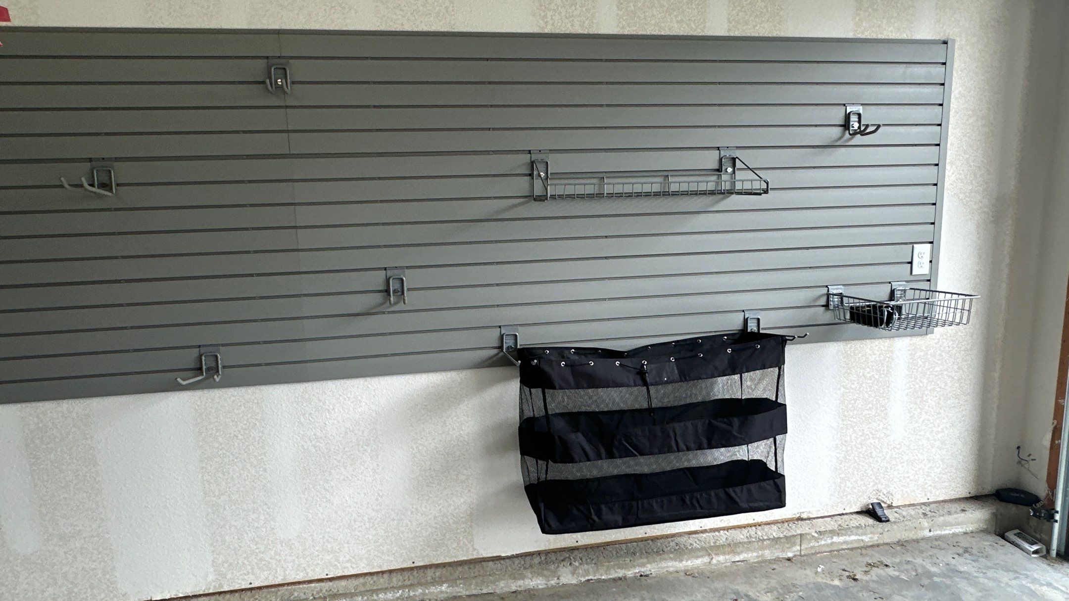Jim H. added Slotwall and bike hoist to his garage by Banner Garage