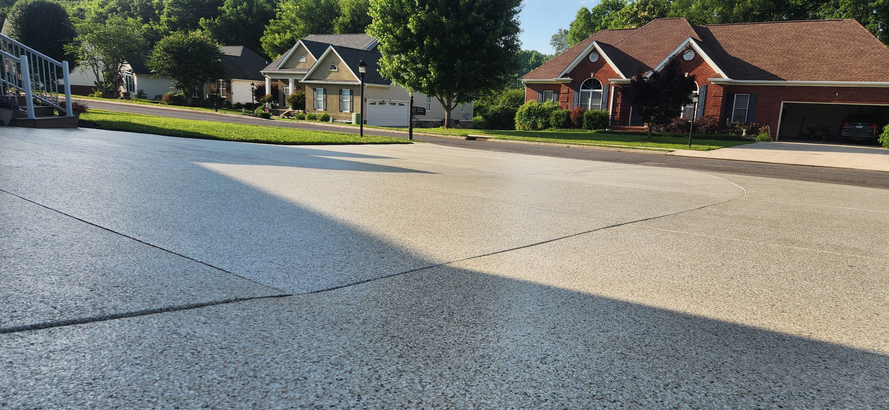 Incredible transformation on Driveway Garage and Sidewalk! by Elite Floor Solutions