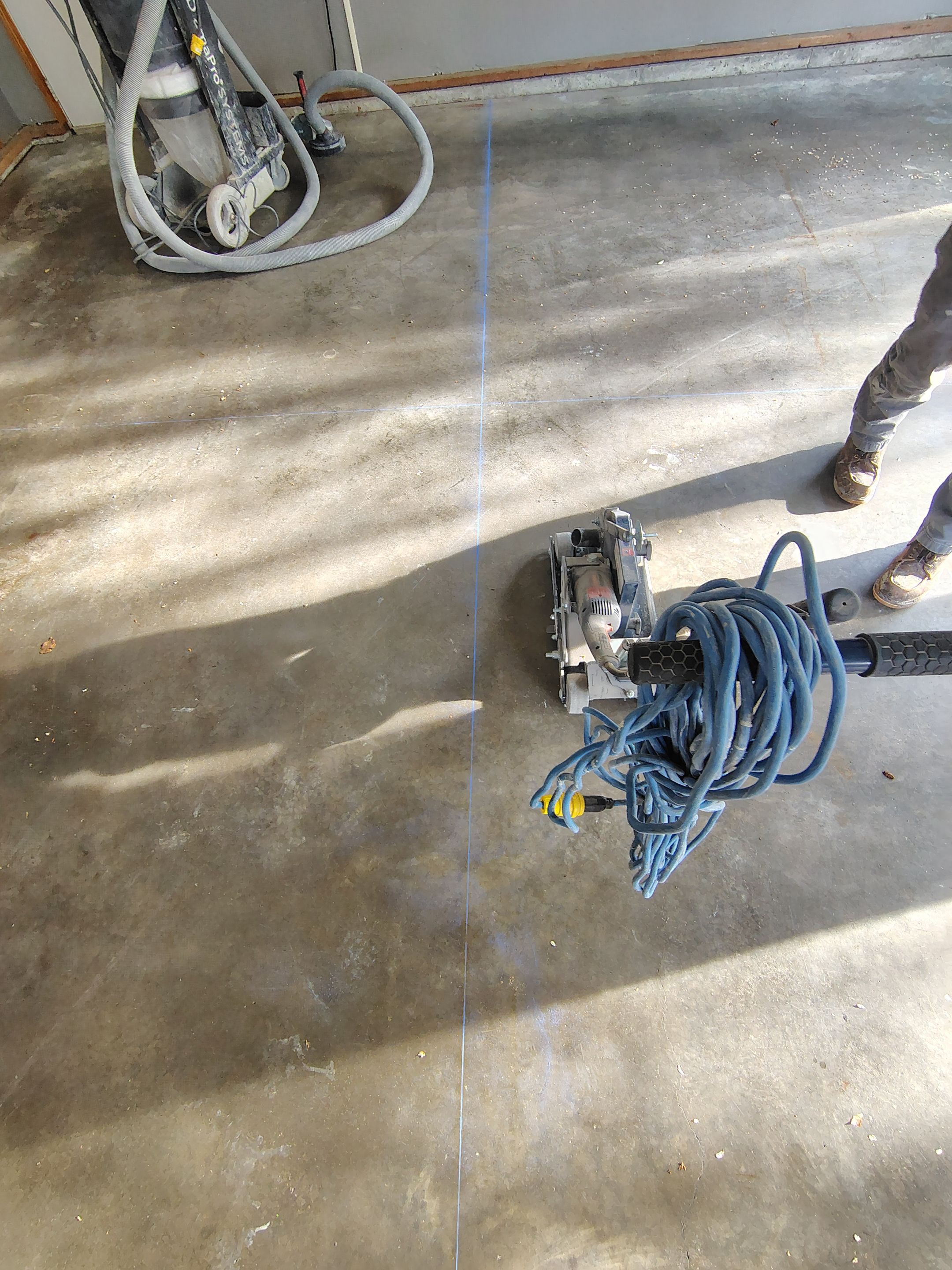 Garage Floor Concrete Coating and Crack Repair in Sioux Falls by Select Painting, Coatings & Garage Cabinets