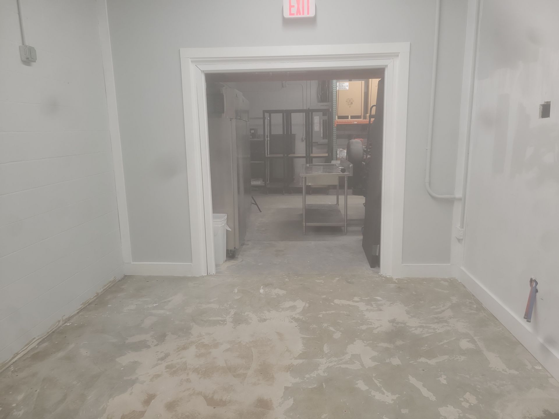 Silverado garage floor coating  by NG Masonry & Construction LLC