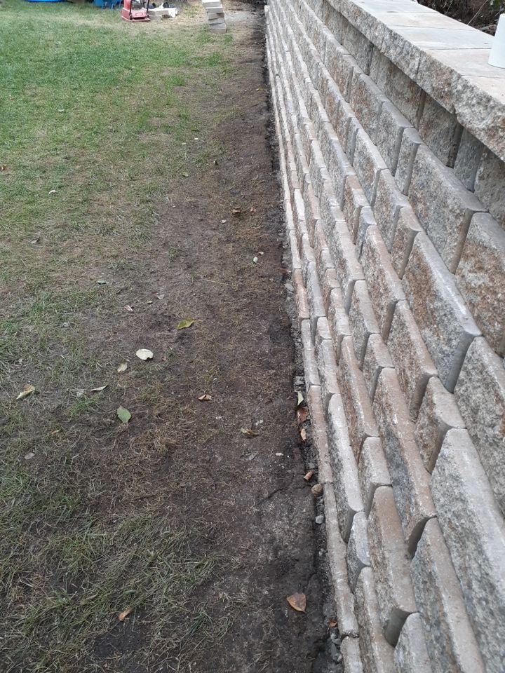 Back Yard Harington Retaining Wall by LAND ESCAPES LLC