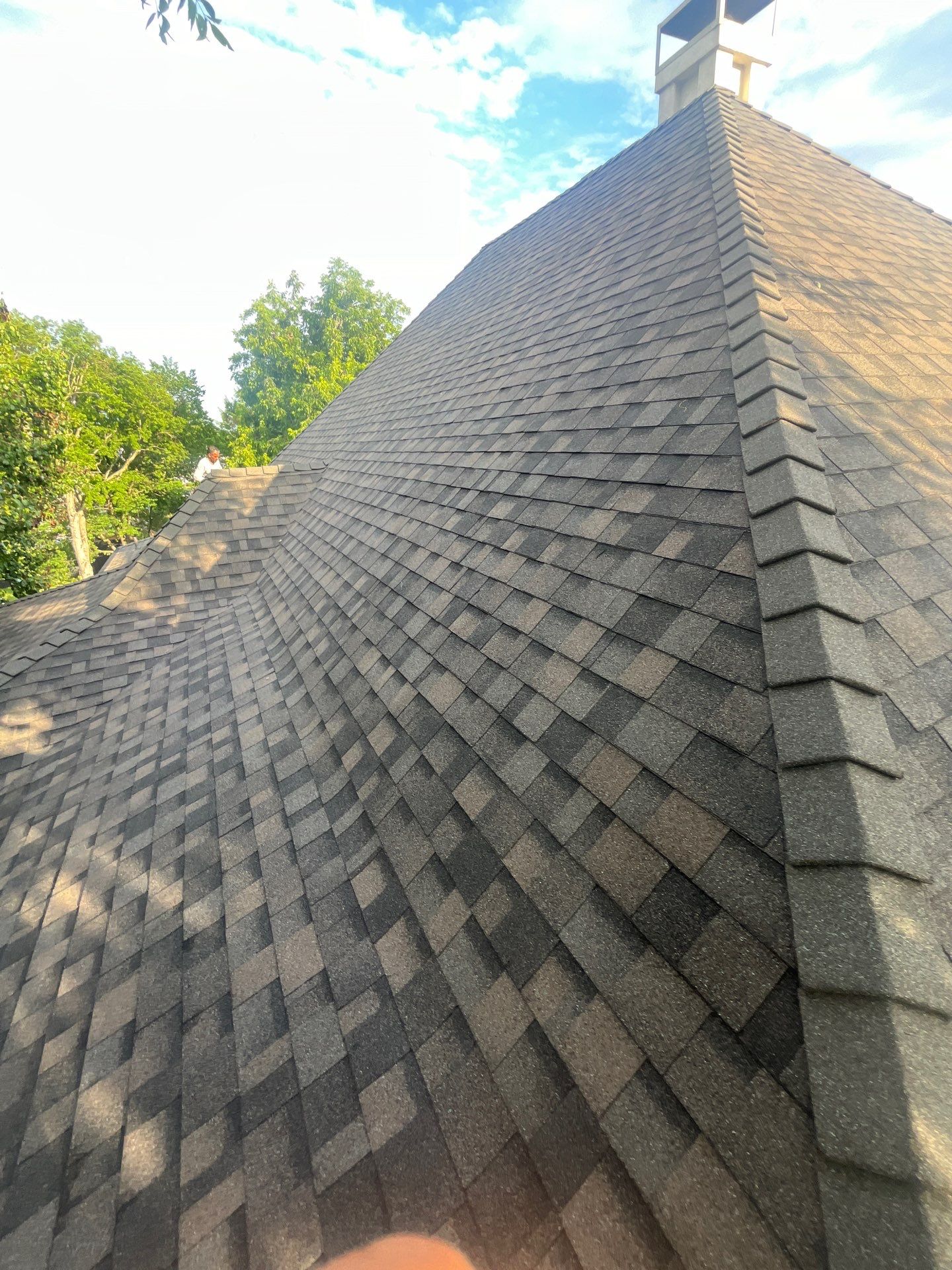 Tan exterior with IKO Driftshake by Tejas Roofworks + Restoration