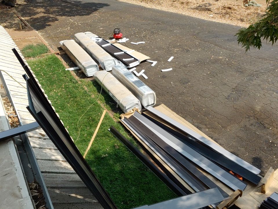 Residential Roofing Installation using Standing seam metal roofing system by Straight Edge Roofing Inc