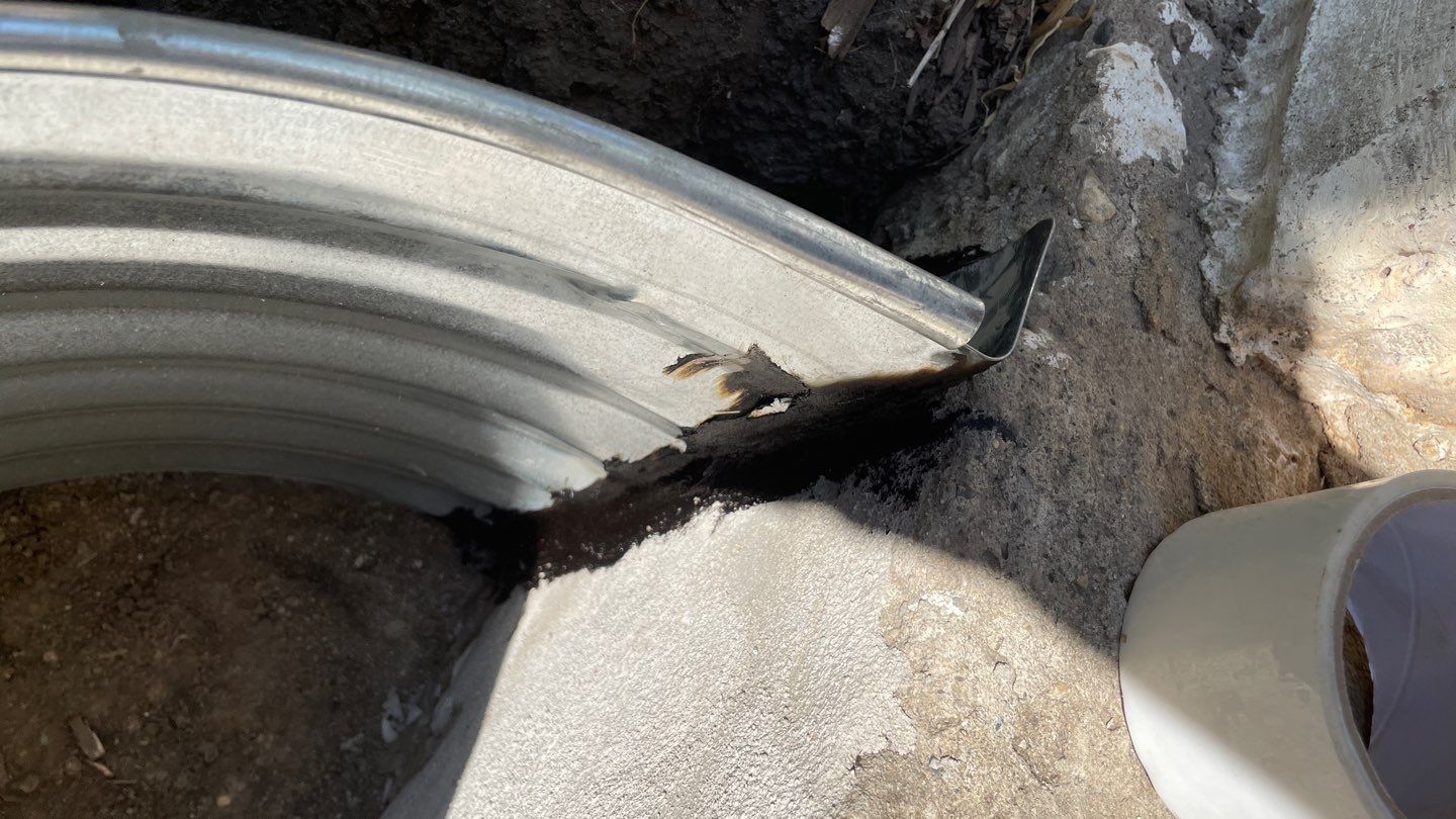 Drain Tile, Window Wells & Buried Discharge in Minneapolis by Waterproofing Northeast
