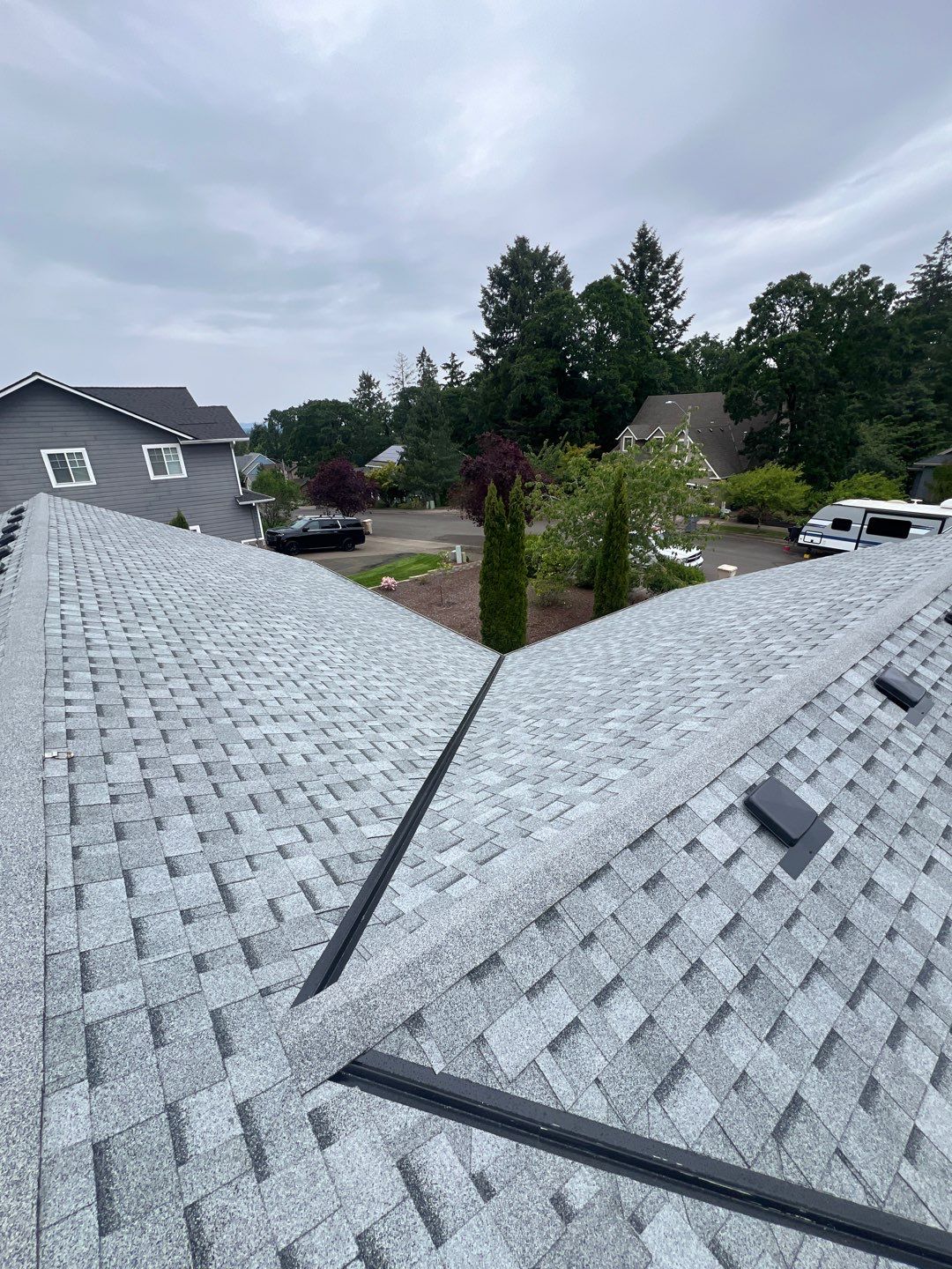 Residential Roofing Installation using IKO Cambridge (Color: Dual Grey) by Orezona Building & Roofing Company, Inc.