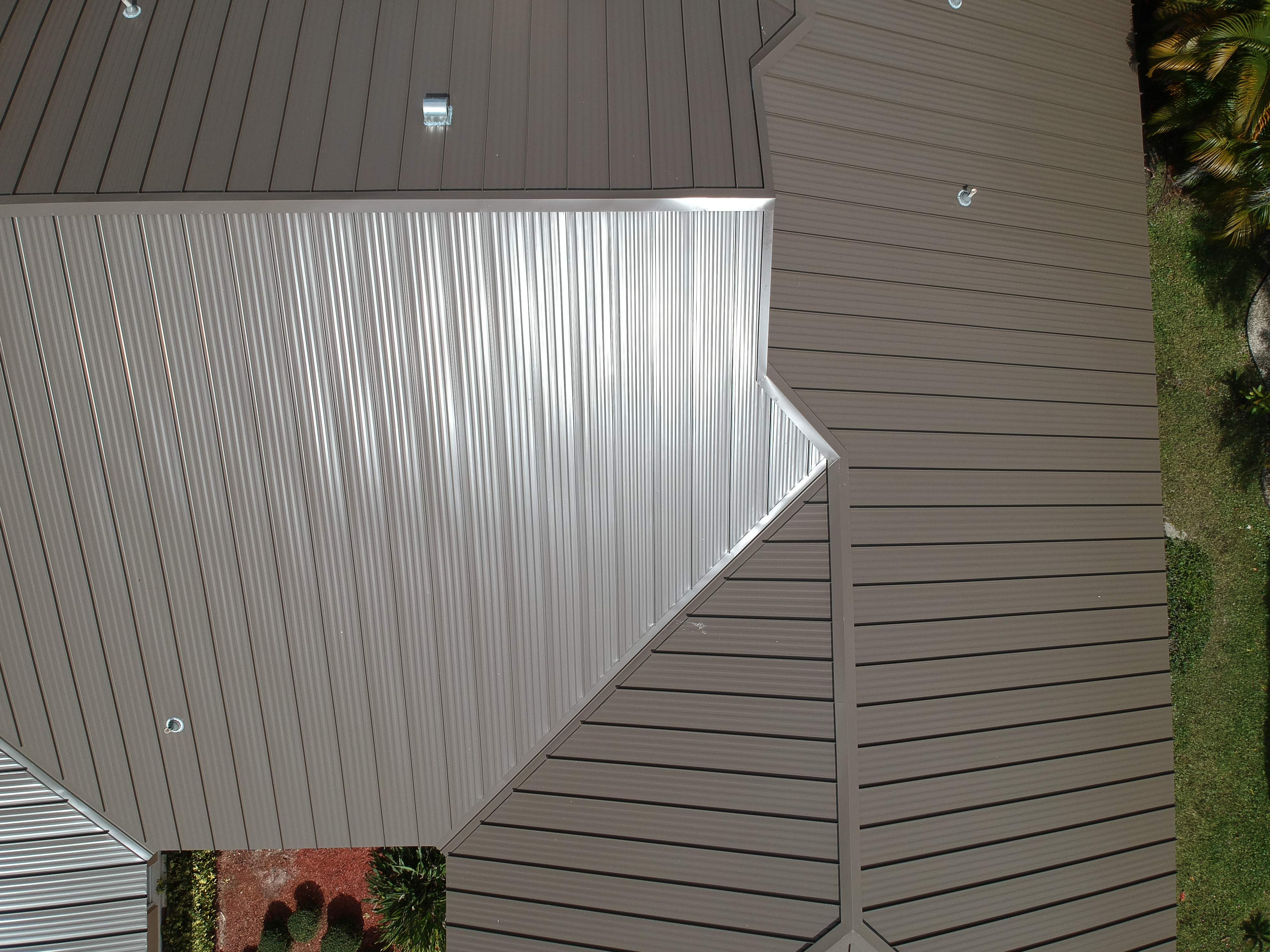 Residential Roofing Installation using 1" Nail strip metal roof by BLUES BROTHERS CONSTRUCTION CORP